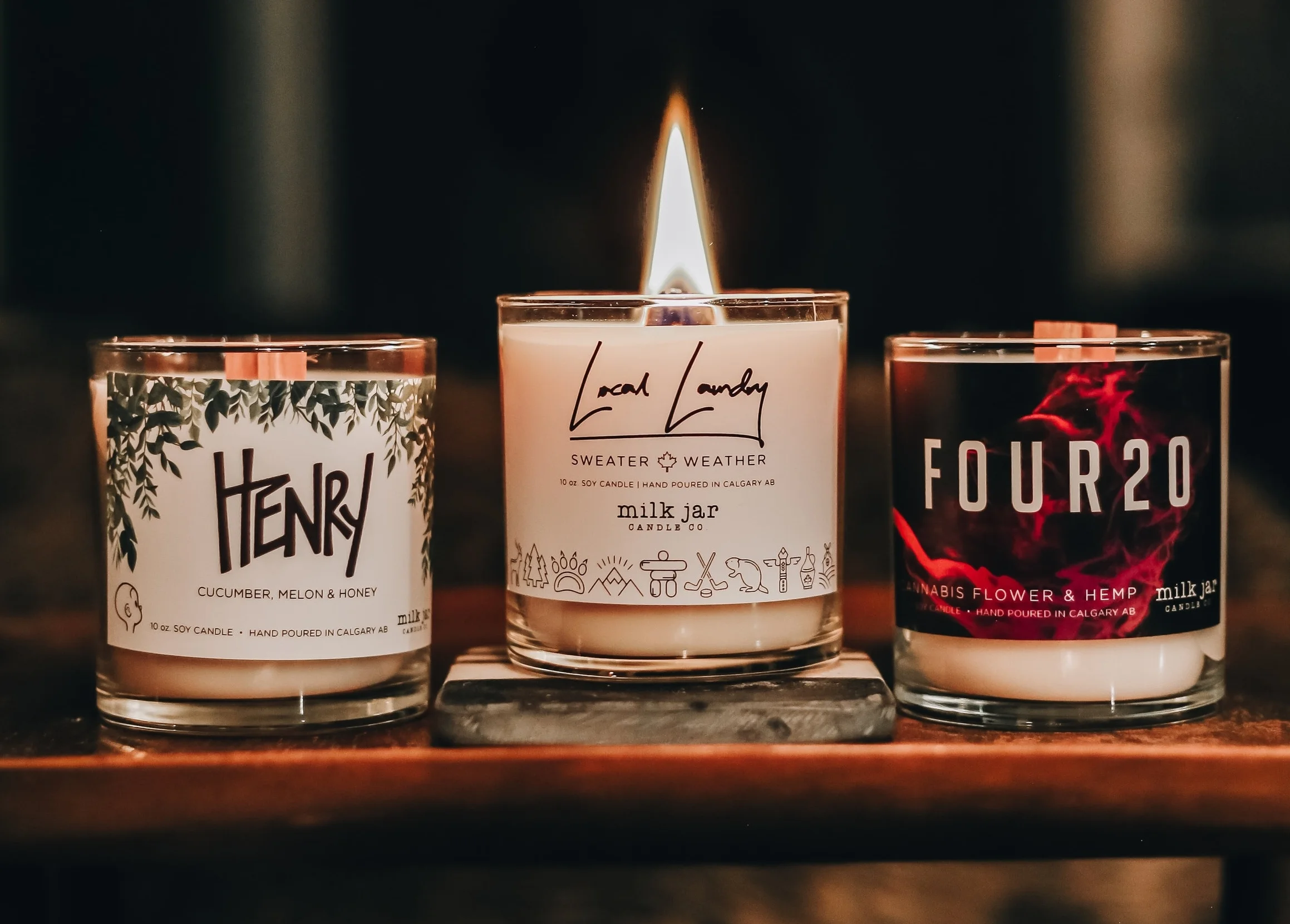 Three of our Collaborative Custom candles we created with Ten Foot Henry , Local Laundry & Four20 . Photo by Carefree Photo .