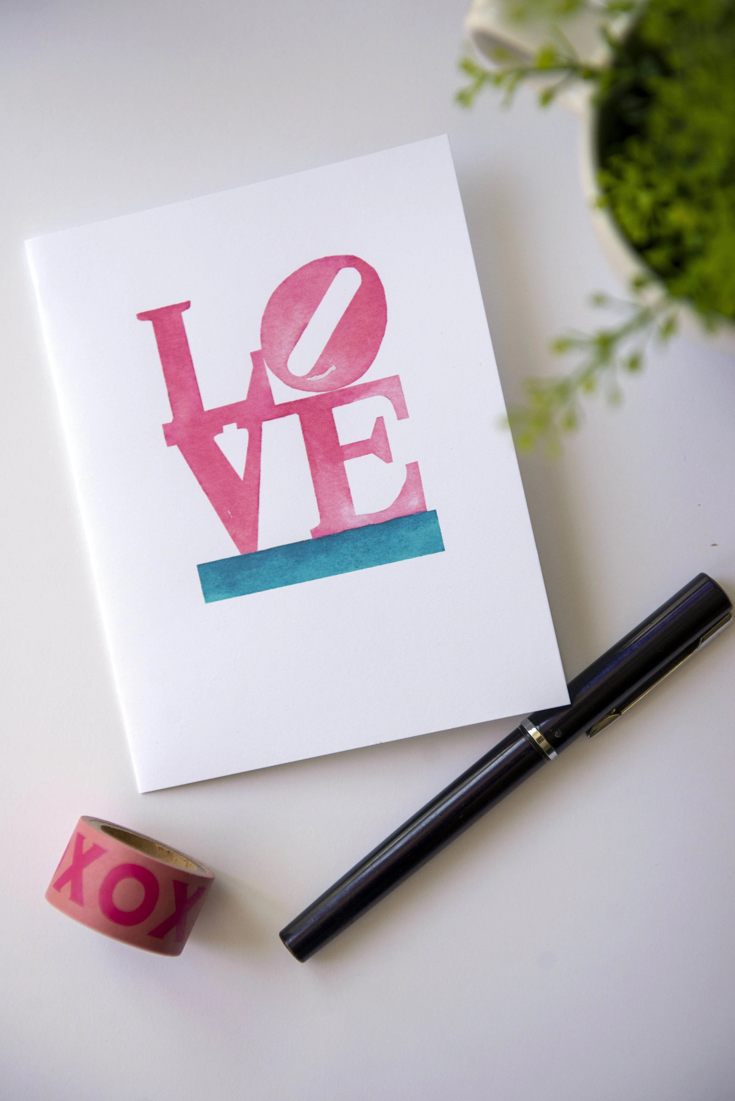 Printable watercolor greeting card featuring the LOVE statue. Download once and print again and again!  Prints (2) cards per 8.5x11 inch paper. 