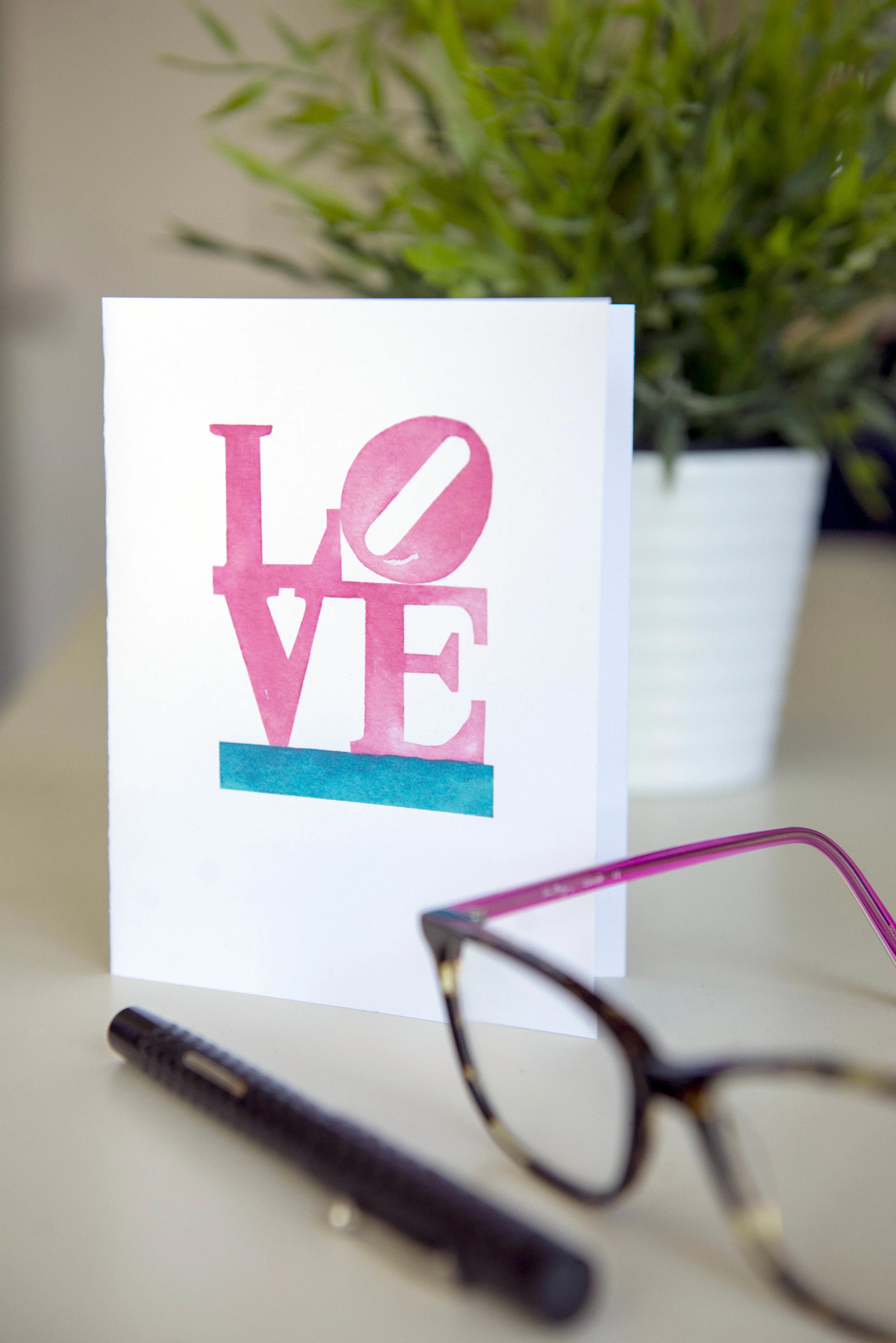 Printable watercolor greeting card featuring the LOVE statue. Download once and print again and again!  Prints (2) cards per 8.5x11 inch paper. 