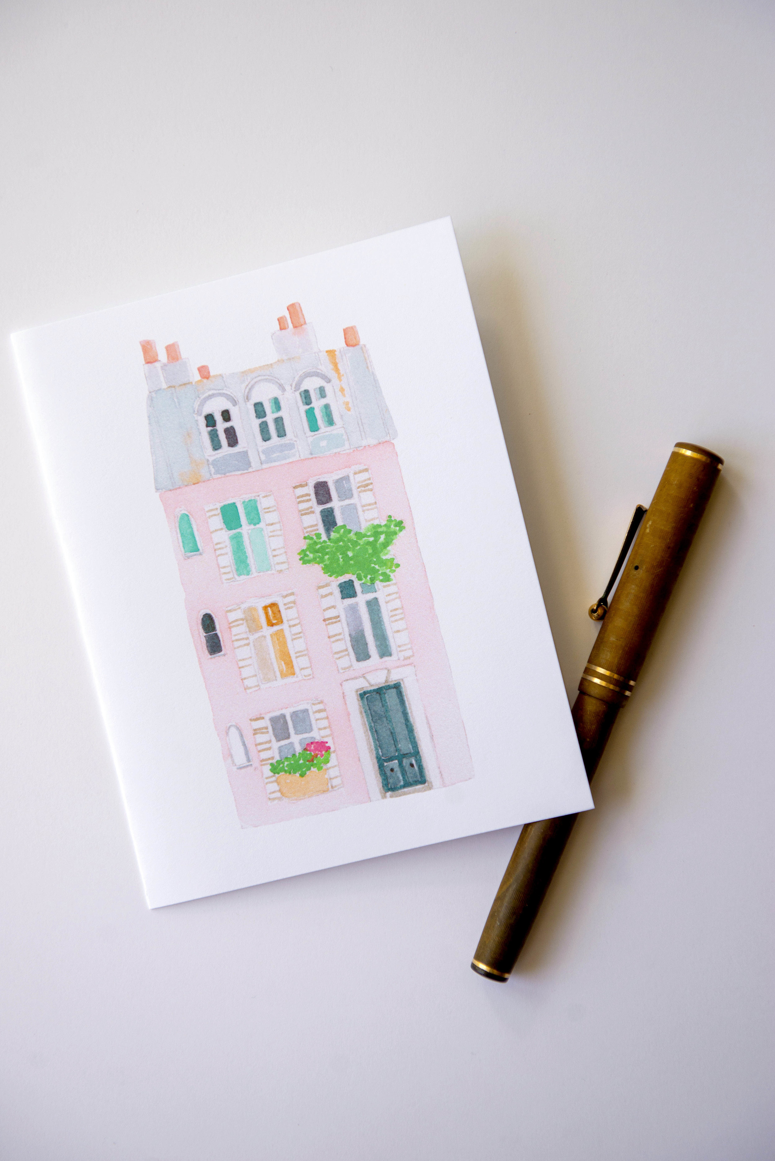 Printable watercolor greeting cards featuring a pink Parisian building. Download once and print again and again!  Prints (2) cards per 8.5x11 inch paper. 