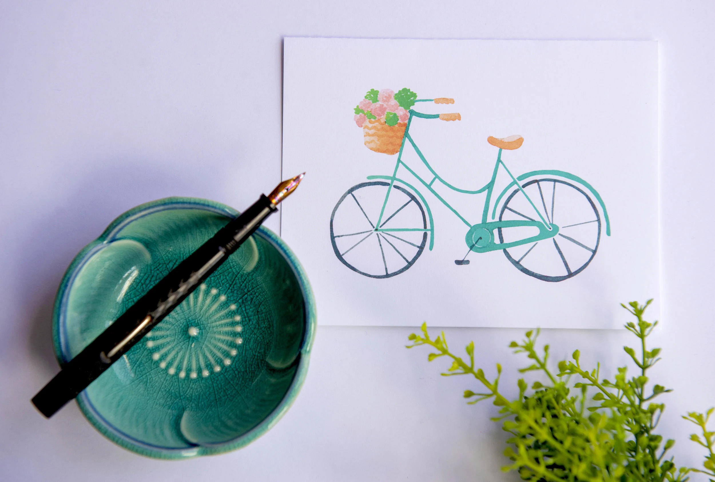 Printable watercolor greeting card featuring a vintage blue bicycle with a flower basket. Download once and print again and again!  Prints (2) cards per 8.5x11 inch paper. 