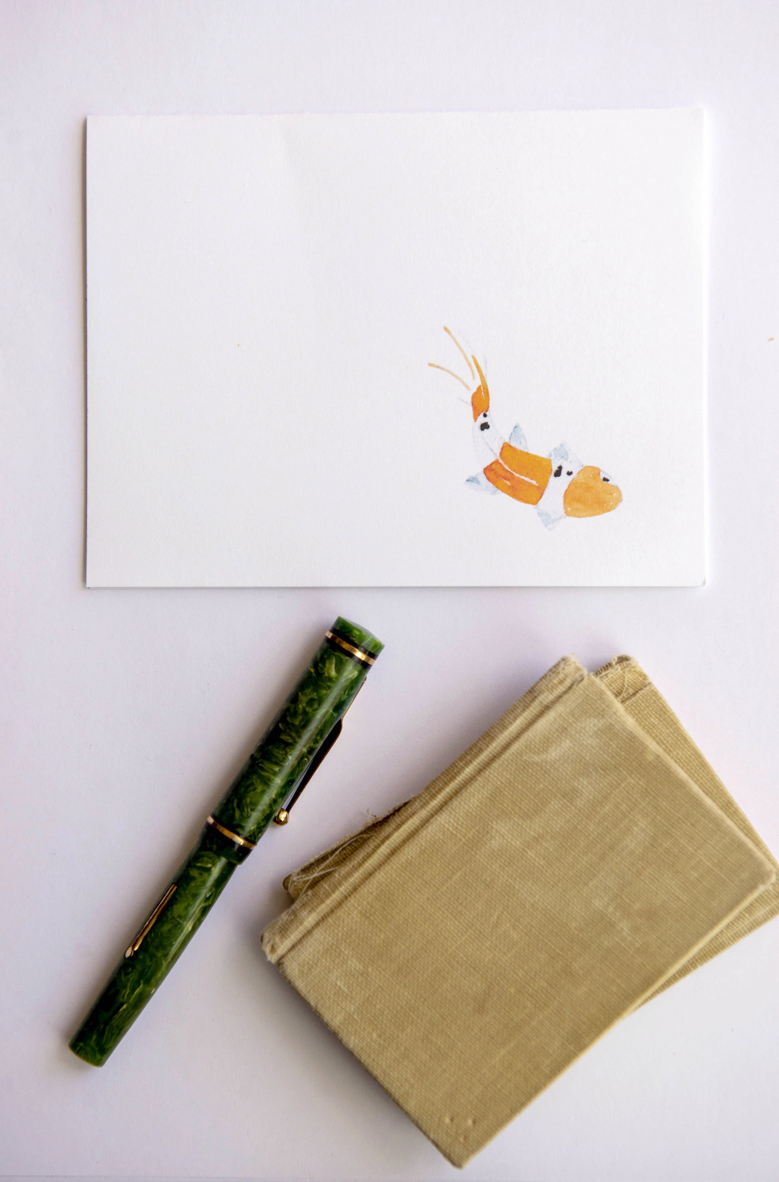 Printable watercolor greeting card featuring an orange koi fish in the lower right corner. Download once and print again and again!  Prints (2) cards per 8.5x11 inch paper. 