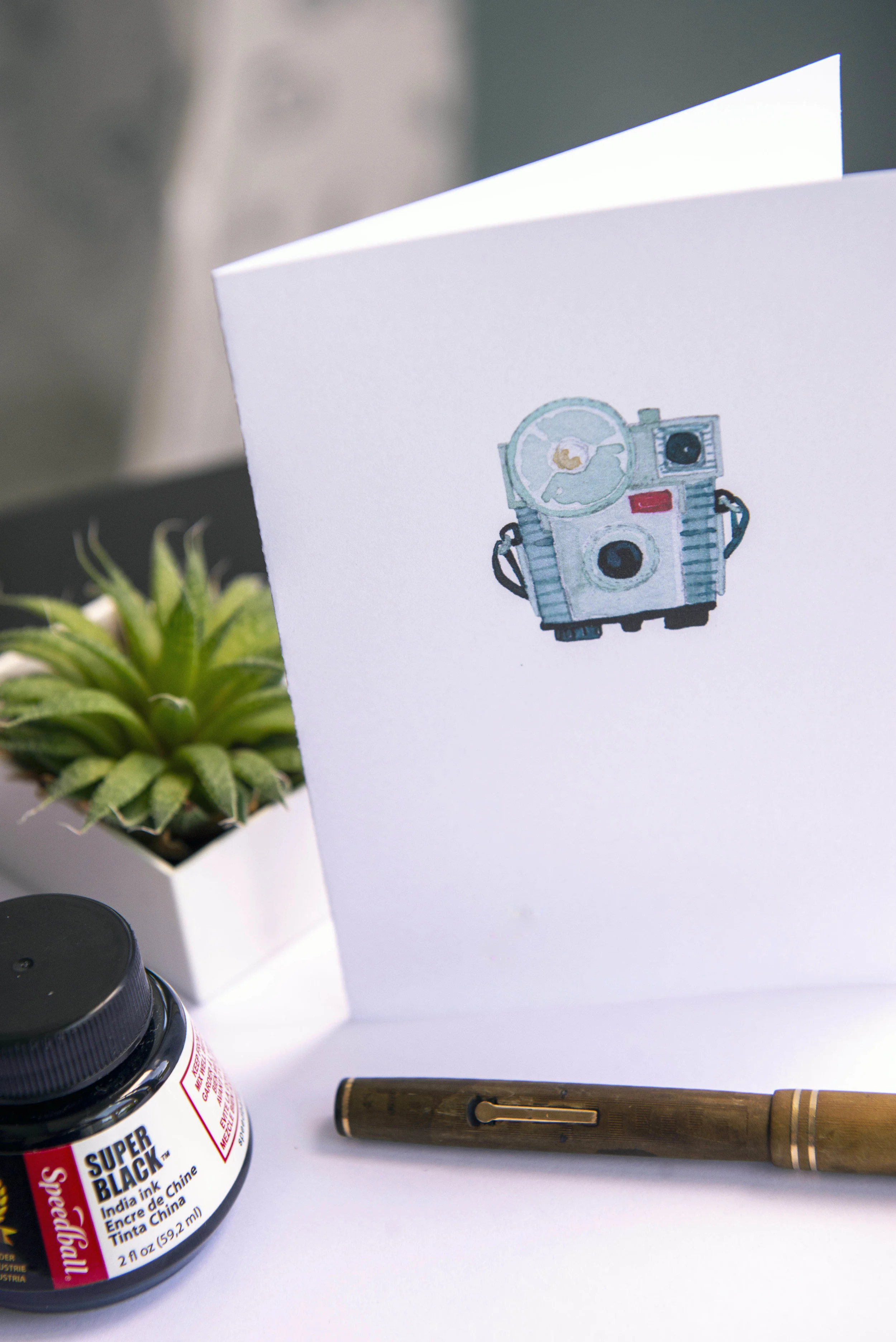 Printable watercolor greeting card featuring a vintage silver Brownie camera. Download once and print again and again!  Prints (2) cards per 8.5x11 inch paper. 