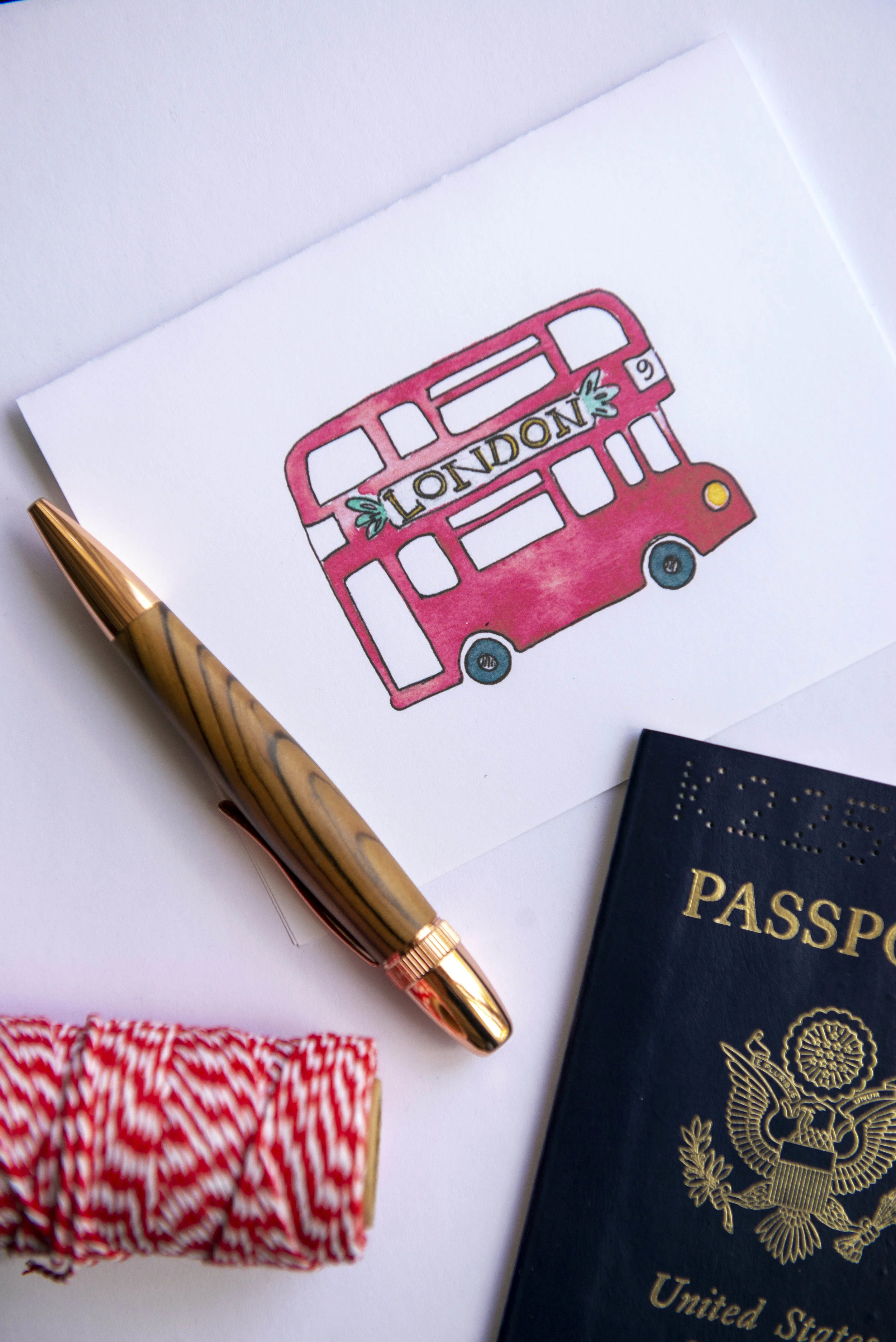 Printable watercolor greeting card featuring a red London double decker bus. Download once and print again and again!  Prints (2) cards per 8.5x11 inch paper. 
