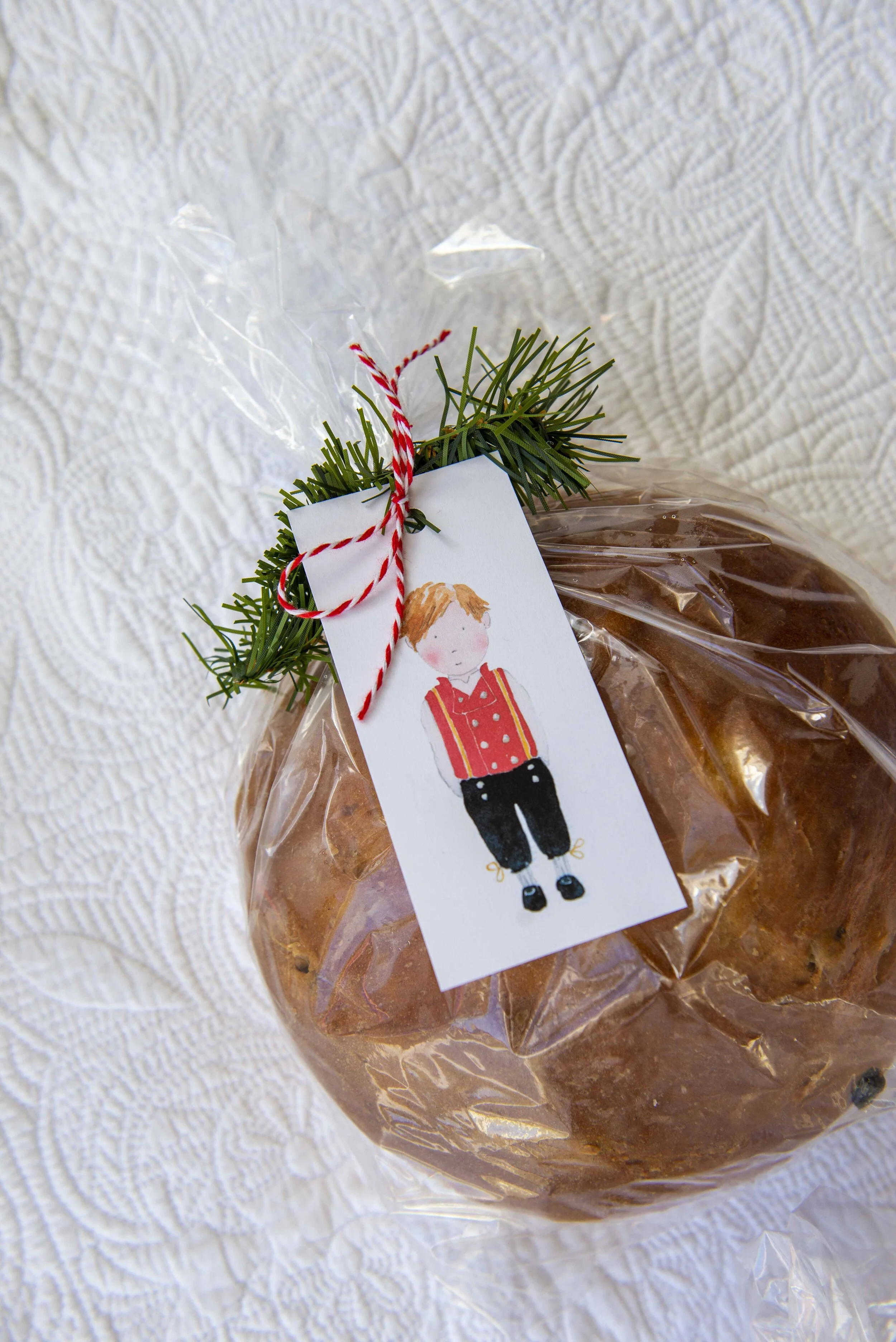 Printable watercolor gift tags featuring a Scandinavian boy in a traditional bunad.  Download and print your own Christmas gift tags!