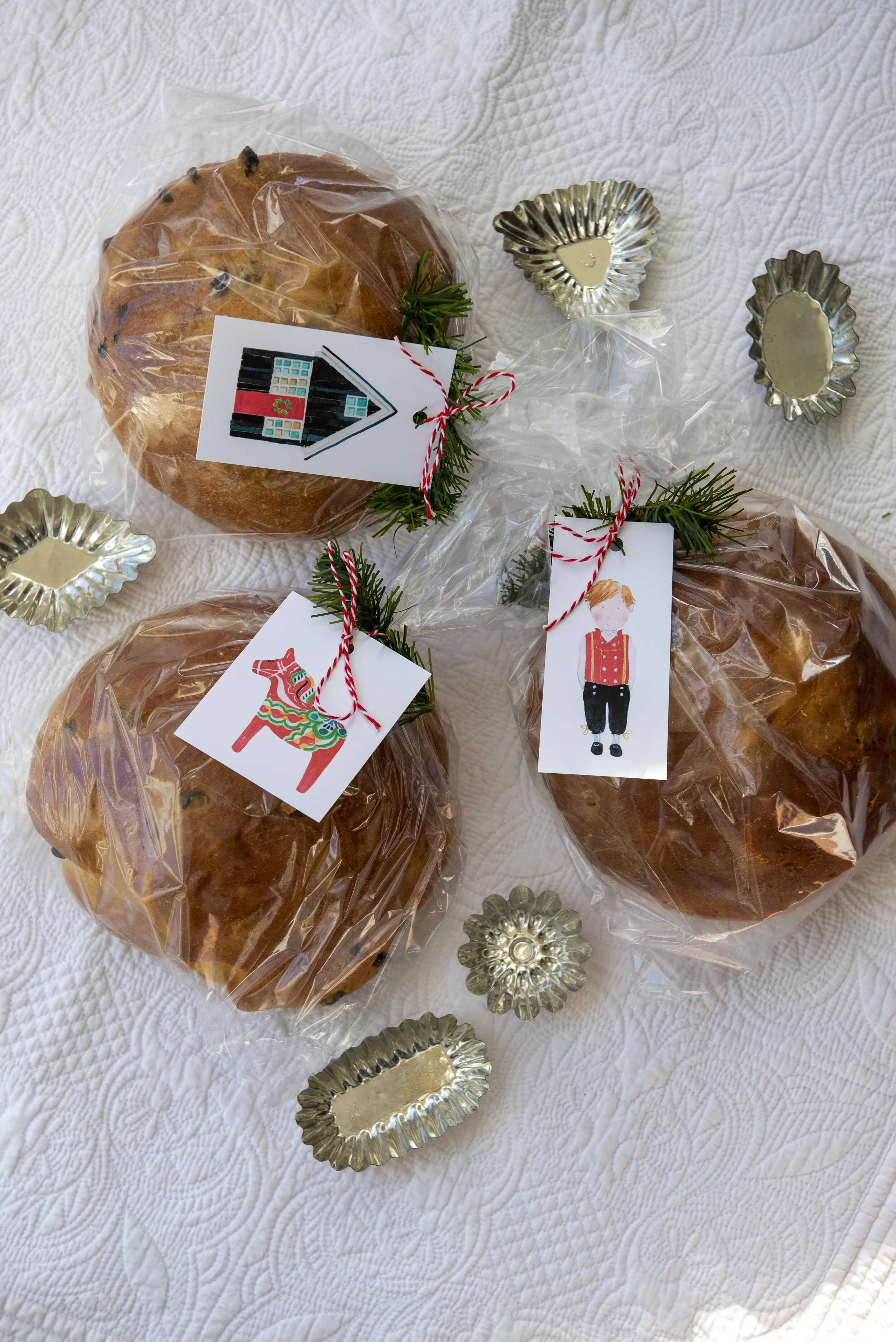 Printable watercolor gift tags featuring a Scandinavian boy in a traditional bunad.  Download and print your own Christmas gift tags!