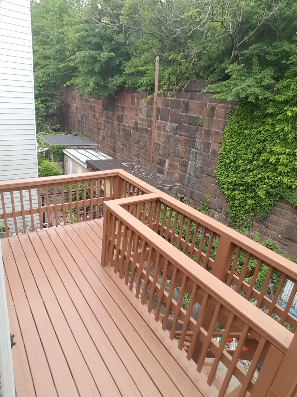 Power washing and painting of deck