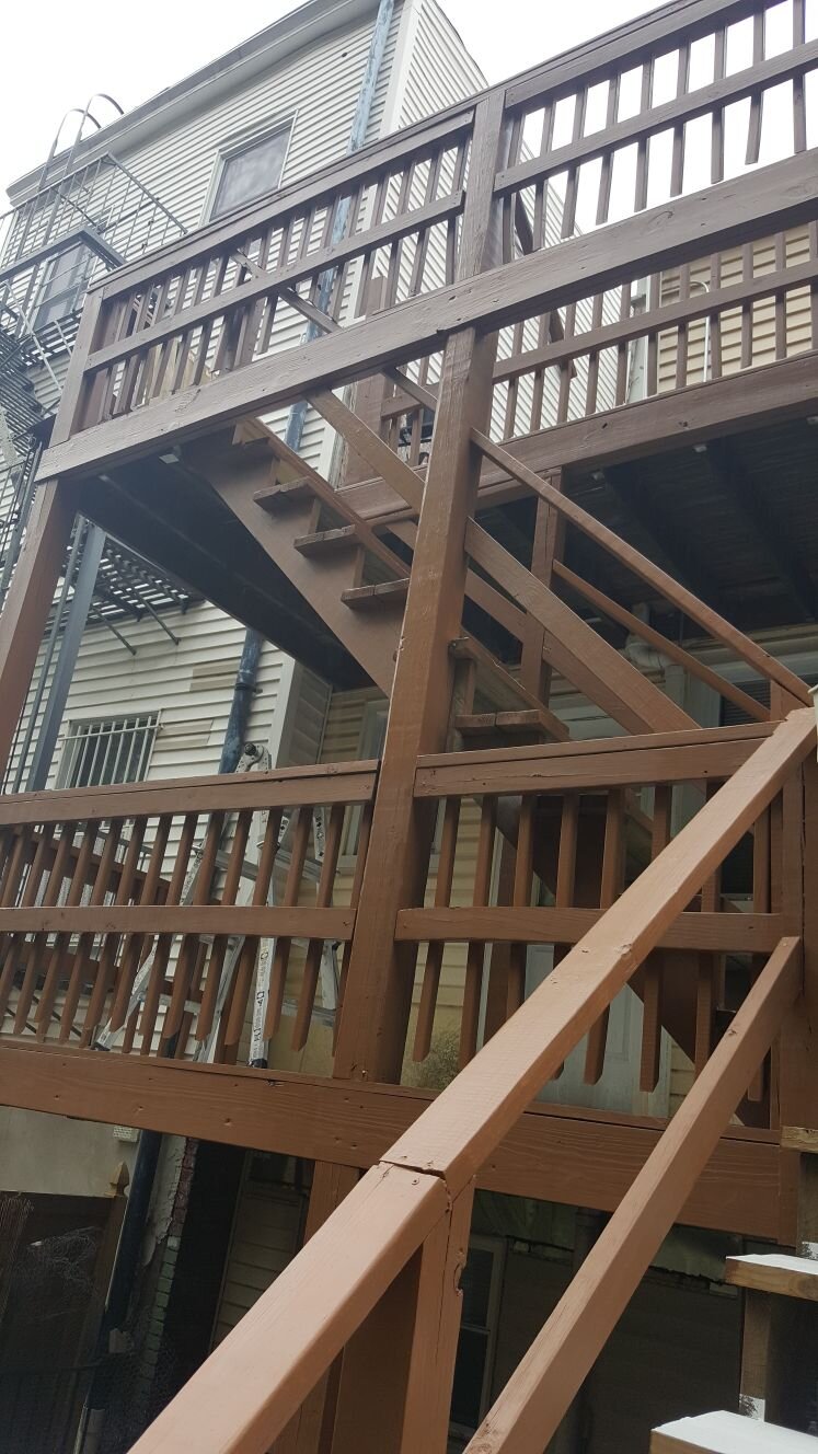 Power washing and painting of deck