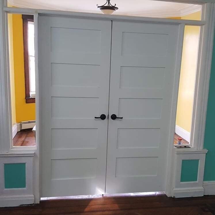 Custom French doors built to partition room