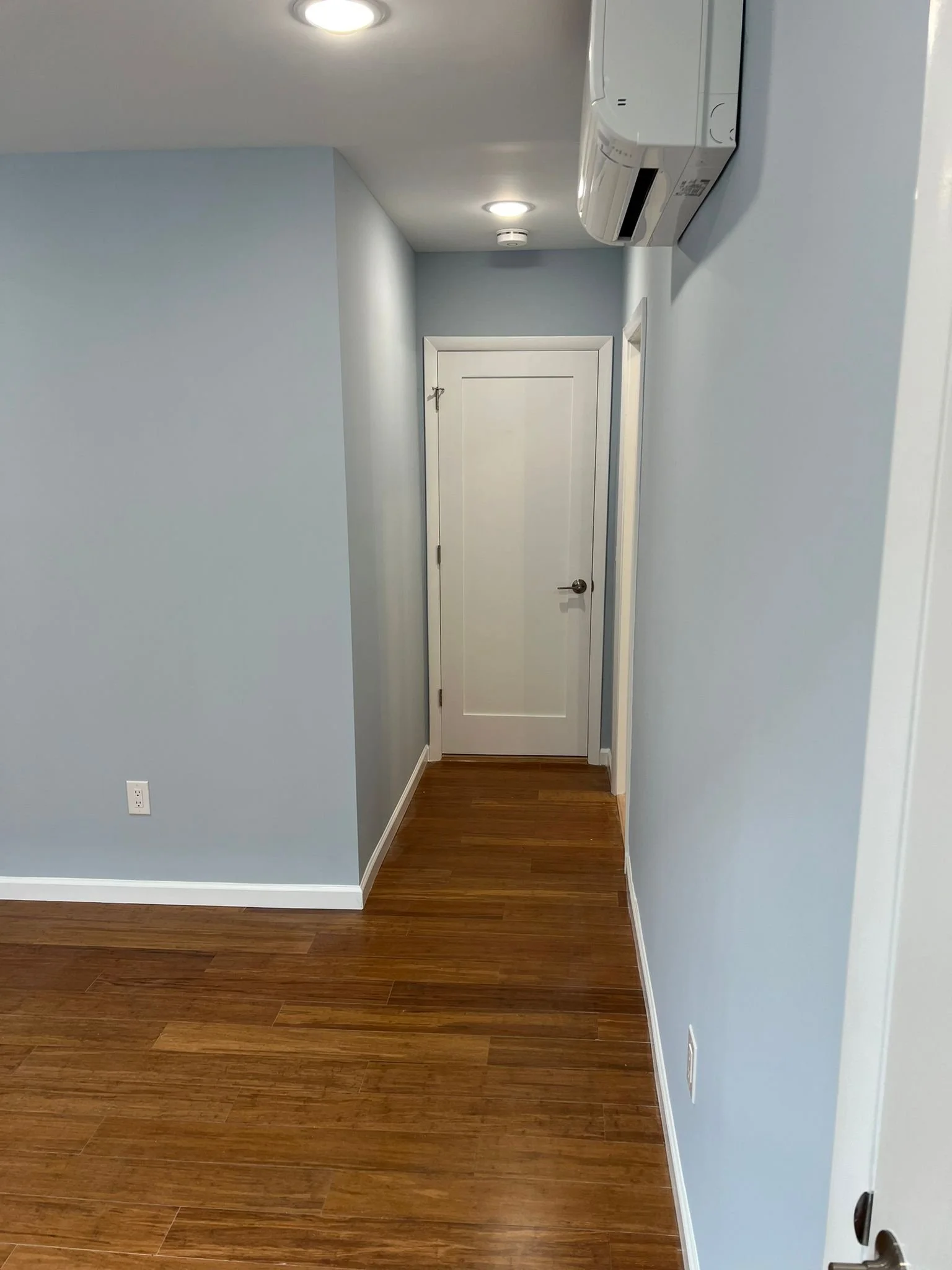New bedroom door, new flooring, new mouldings, new AC, new lighting, fresh paint