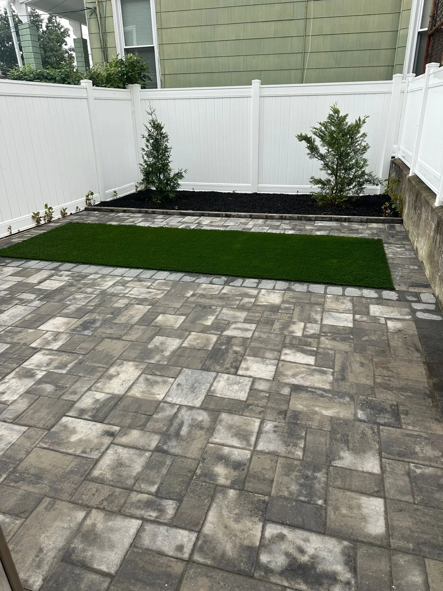 New pavers, turf and green space