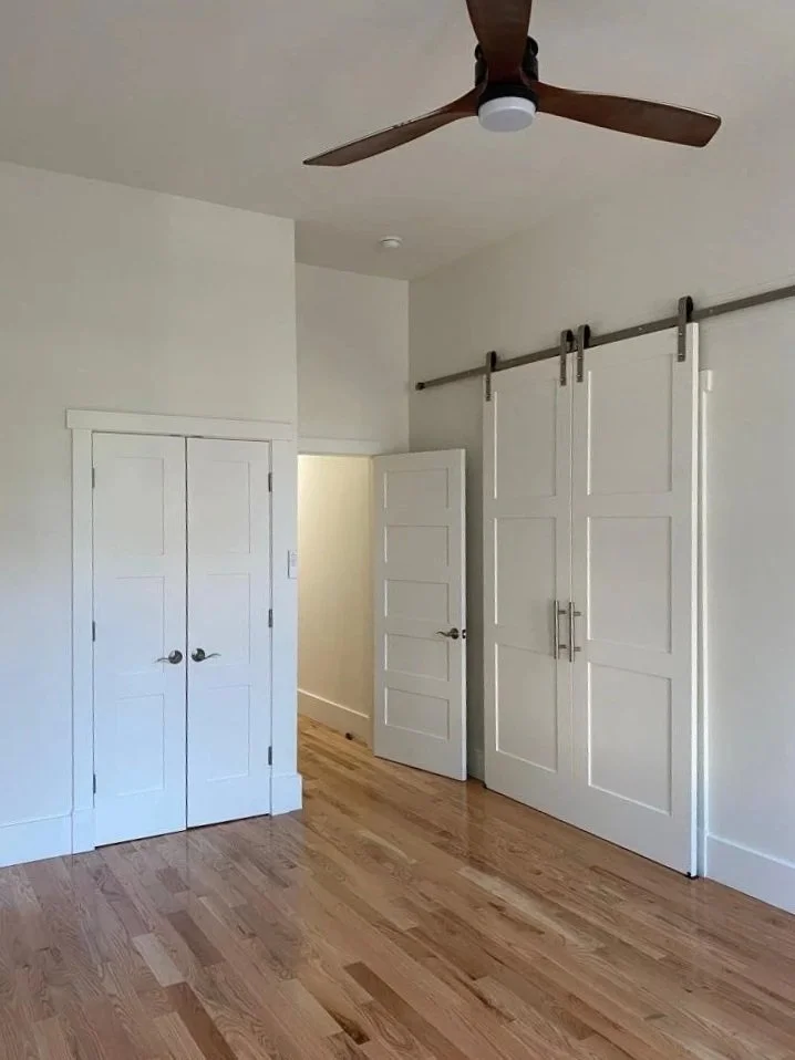 Custom barn yard door installation, new flooring, fresh paint, new lighting/fan