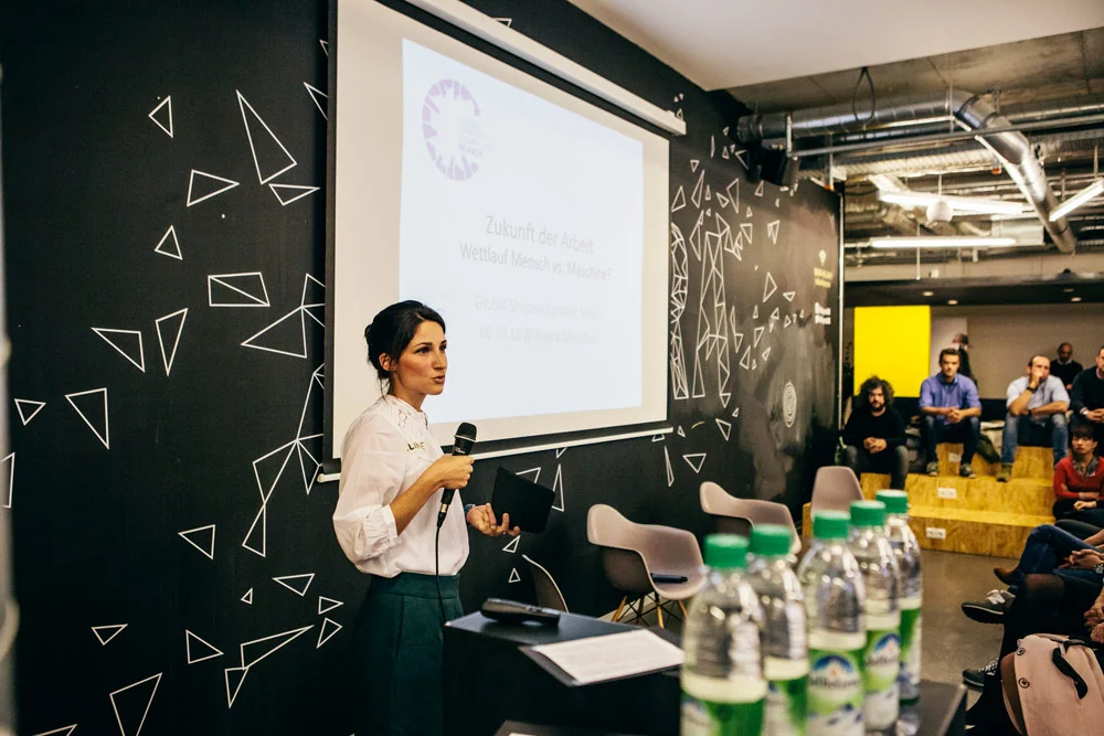 Aline moderating an event organised with the Global Shapers in Munich on the 'Future of Work'.