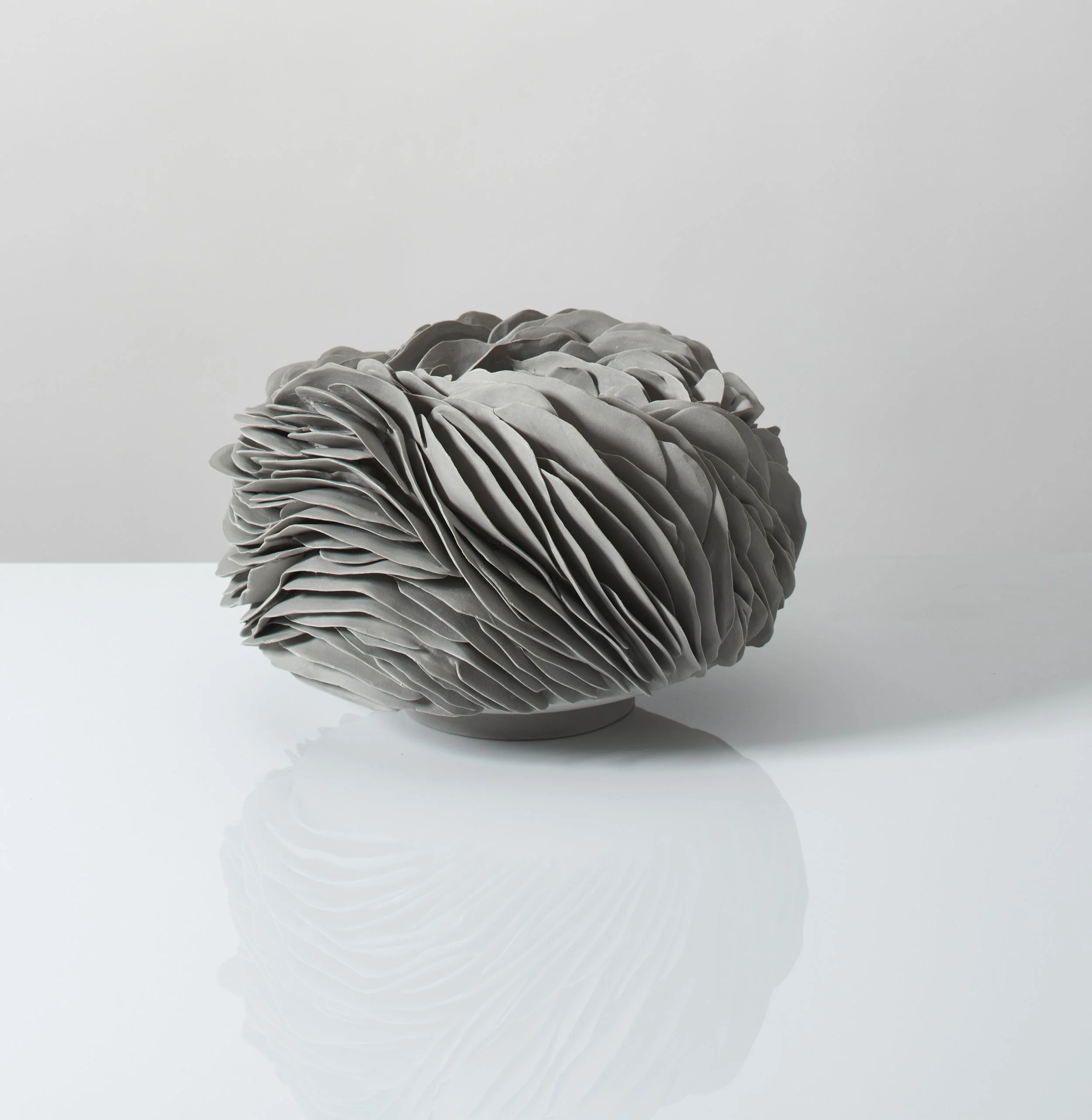 Grey porcelain nest. 25cm W x 20cm H. 