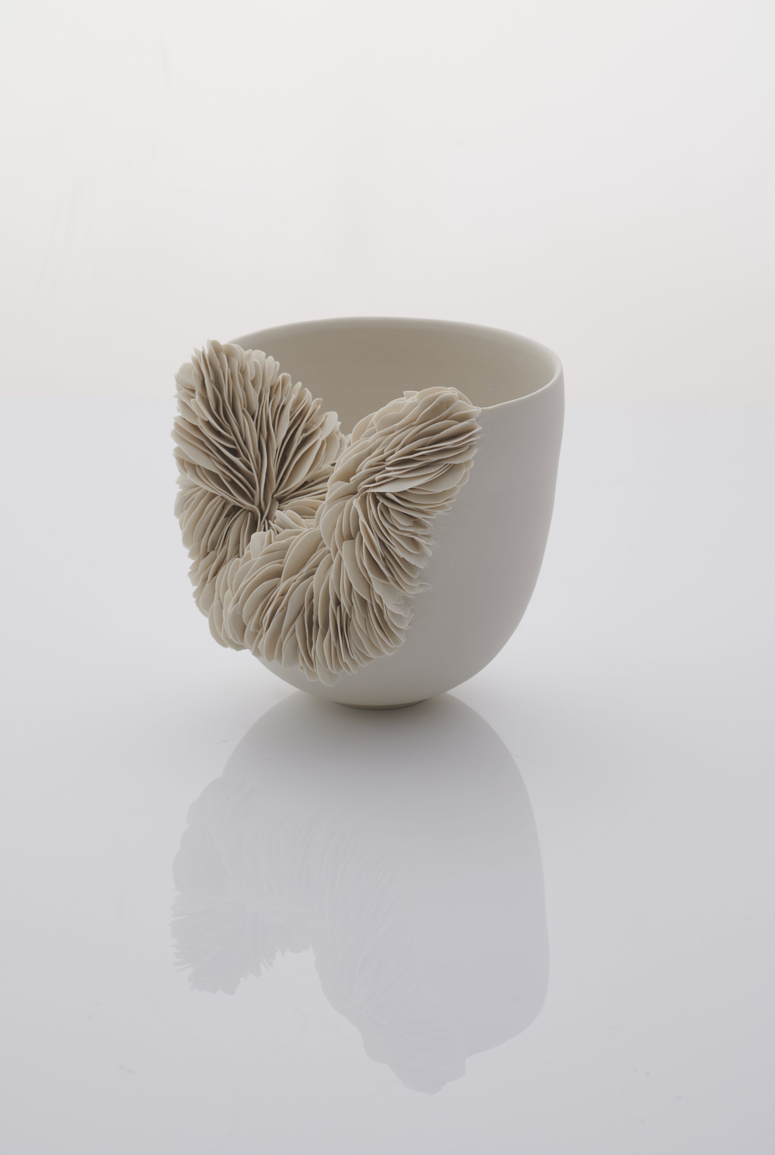Collapsed Porcelain Vessel. 20cm H x 19cm W. 