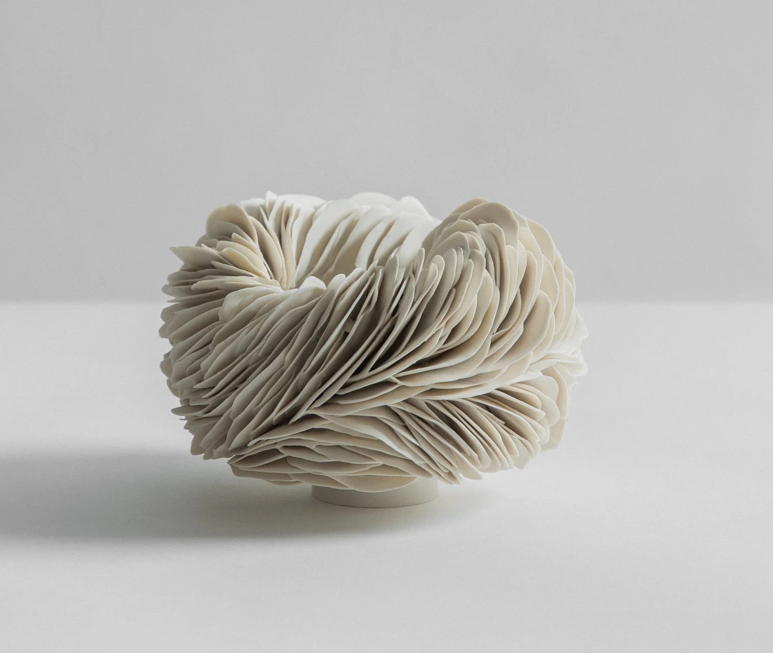 Porcelain nest. 20cm W x 18cm H. 