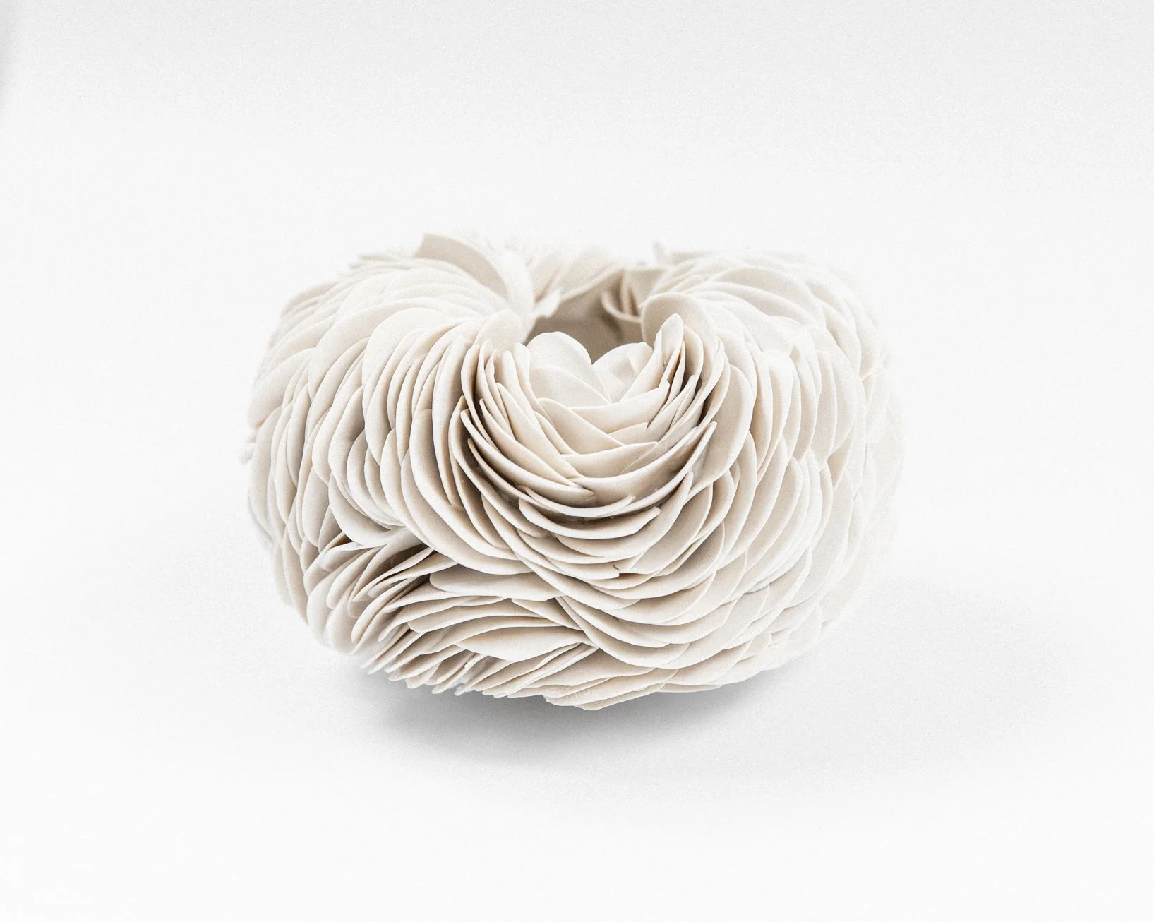 Porcelain nest. 22cm W x 20cm H. 