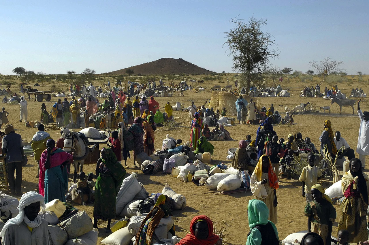 Hundreds of refugees waiting to be moved from Himera, vicinity of Birak, to camps, 4 hours drive from there.