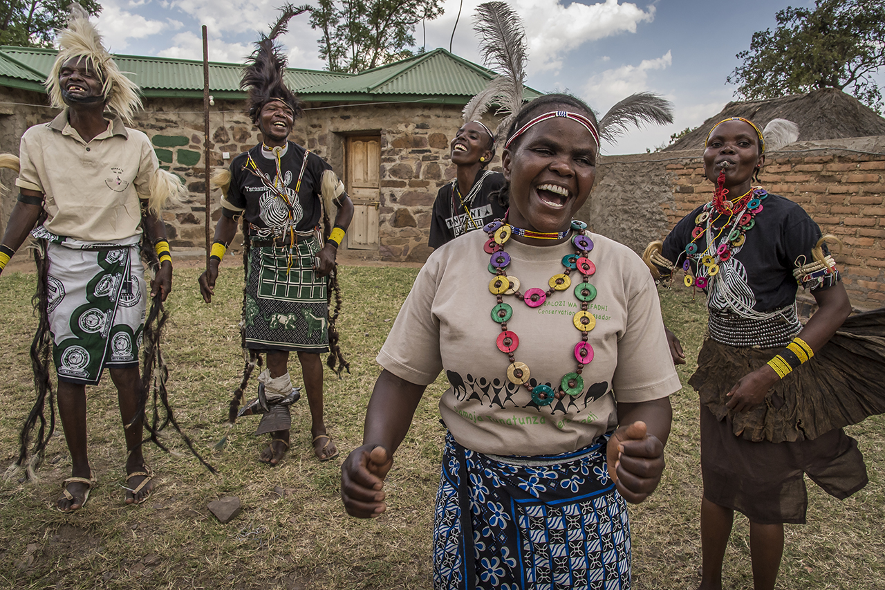 Members of the group "Sinduka Cocoba" interprets the "Singori" a welcoming song in the village Nyichoka, about 30 kilometers West of the Serengeti. The object of "Sinduka Cocoba" is microcredit in order to allow its members to invest in projects tha