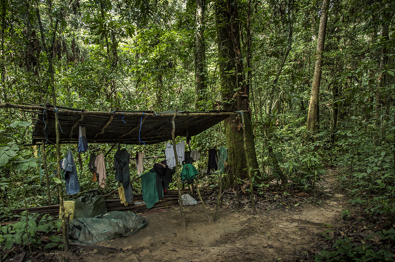 At the entrance of "Camp Boyé", an eco-camp of the Wild Chimpanzee Foundation (WCF) in the middle of the tropical forest of Taï, eco-guides tries to dry their clothes. The humidity is extremely high in the forest. Everything dries really slowly, if