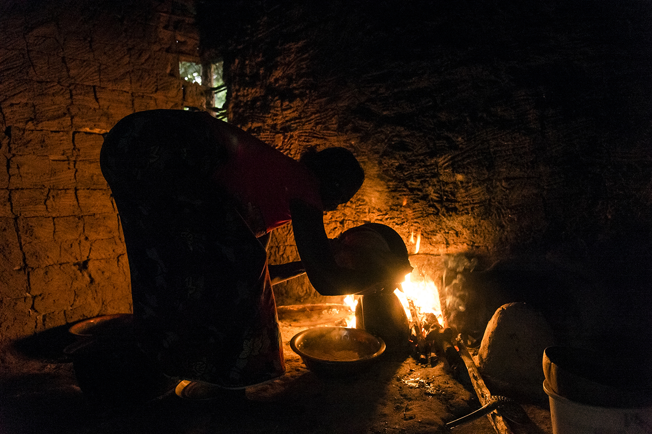 In a house in the village of Gouleako, close to the Taï National Park, a 10-minute drive from the town of Taï, a woman prepares the evening meal. Gouleako is part of an eco-tourism circuit. Visitors can spend the night there eating and hearing the h