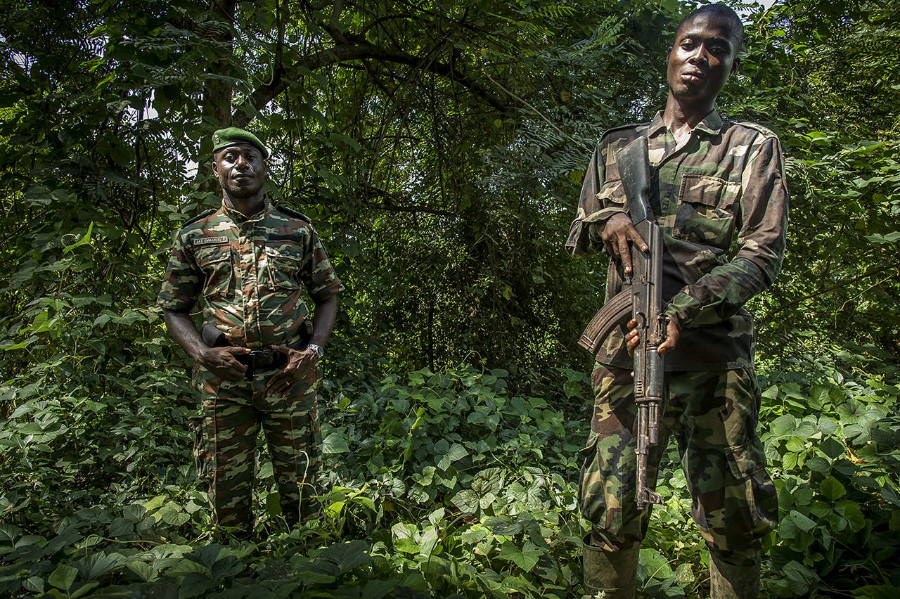 Emmanuel Francelin Ake (left), Head of Sector of the Ivorian Office of Parks and Reserves (OIPR) in the town of Djouroutou, on the western edge of the Taï National Park, responsible for protecting the park and hunting poachers. The animals that are
