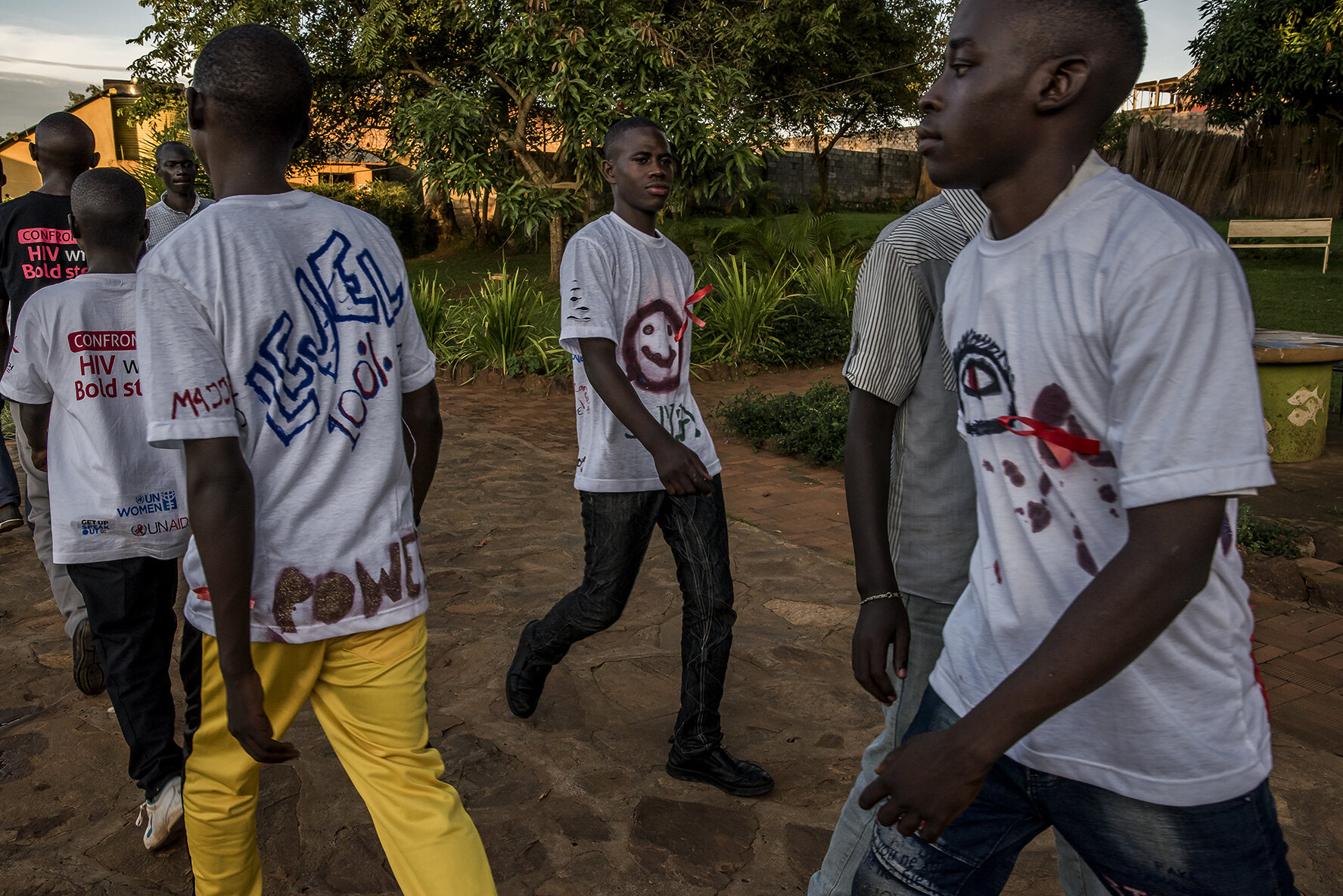 At Banana Village, a lakeside resort on the shore of Lake Victoria, the nine male candidates qualified for the grand finale of the Y+ beauty contest, are training to adopt a cool model walk, essential when they parade on the podium. The Y+ beauty co