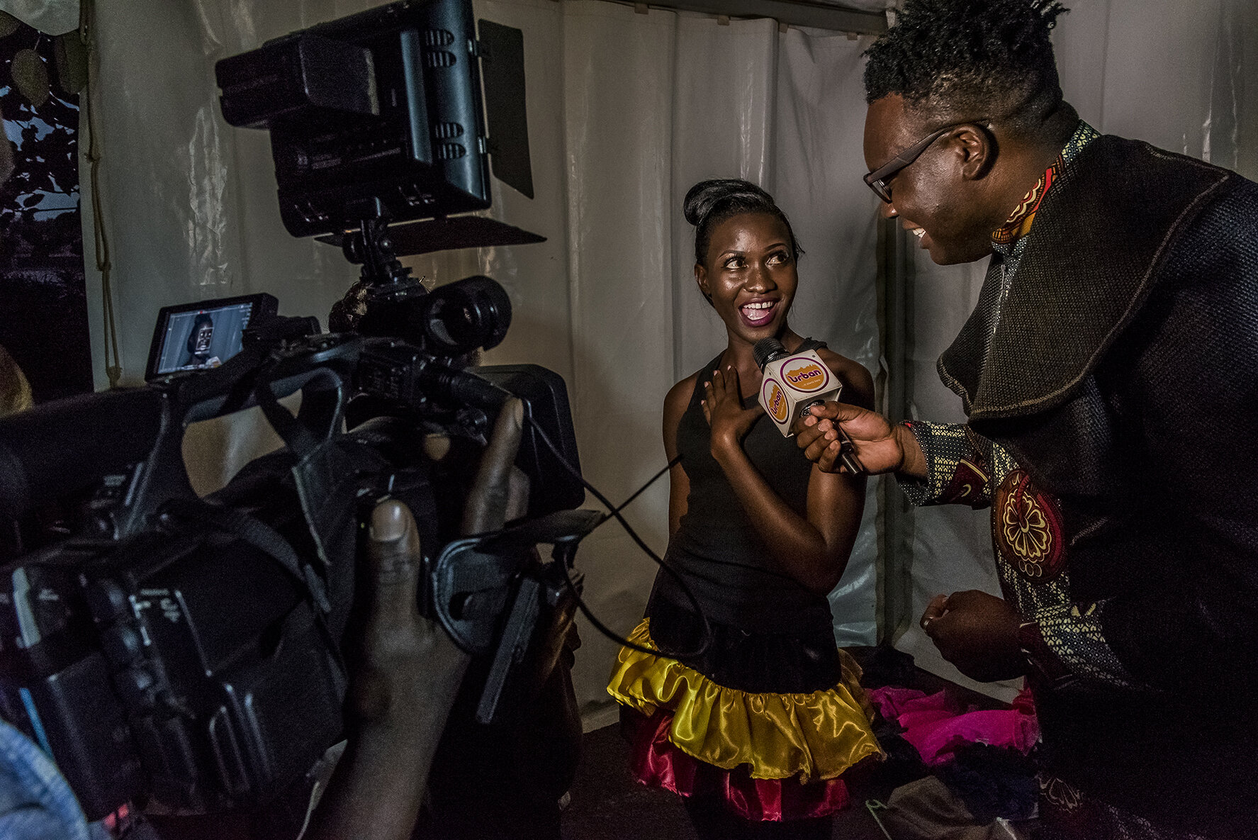 A candidate is interviewed by Urban TV, the trendy Ugandan channel, behind the scenes.