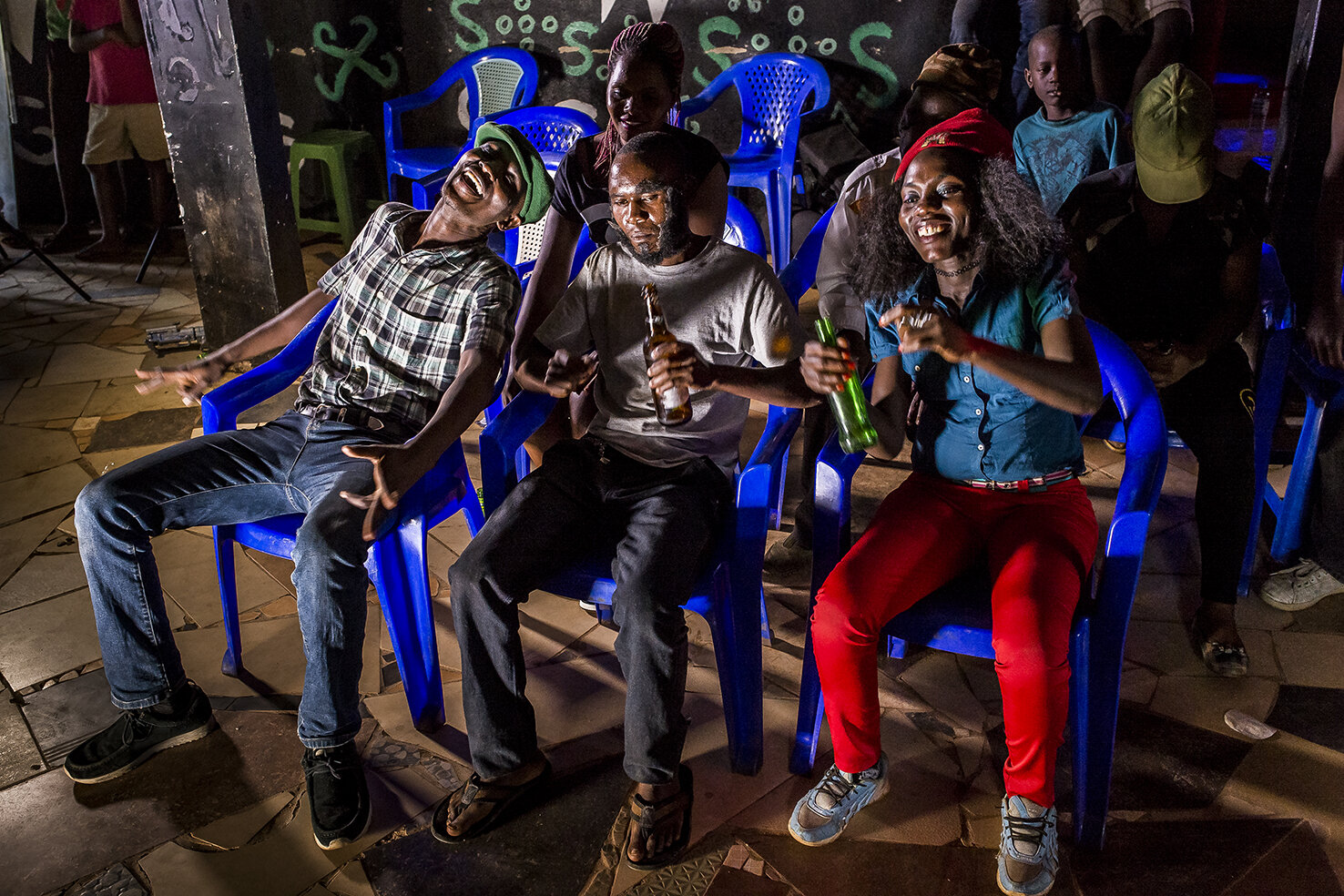  In a night club, actors play the role of spectators. The shooting is a musical, coproduction between Wakaliwood and a musical producer of Kampala, starring Waka Starz, Wakaliga children actors and the Ghetto Kids Triplets, a famous group of Ugandan 