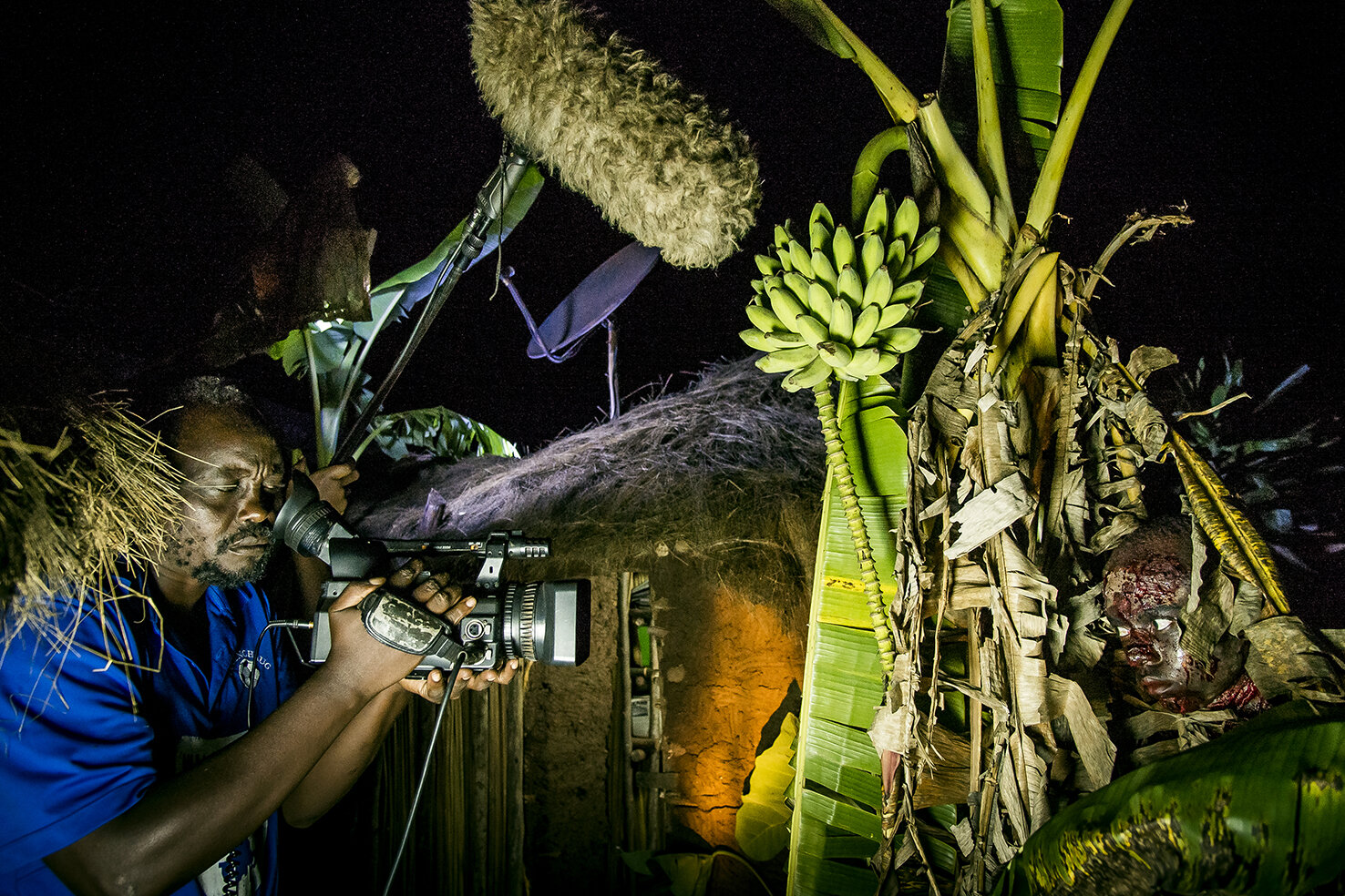  Isaac Nabwana the creator and director of Wakaliwood shoots some night sequences of his movie «&nbsp;Eaten Alive&nbsp;», in the courtyard of Wakaliwood. The set is a village where lives some cannibals / zombies. The production of «&nbsp;EatenAlive&n