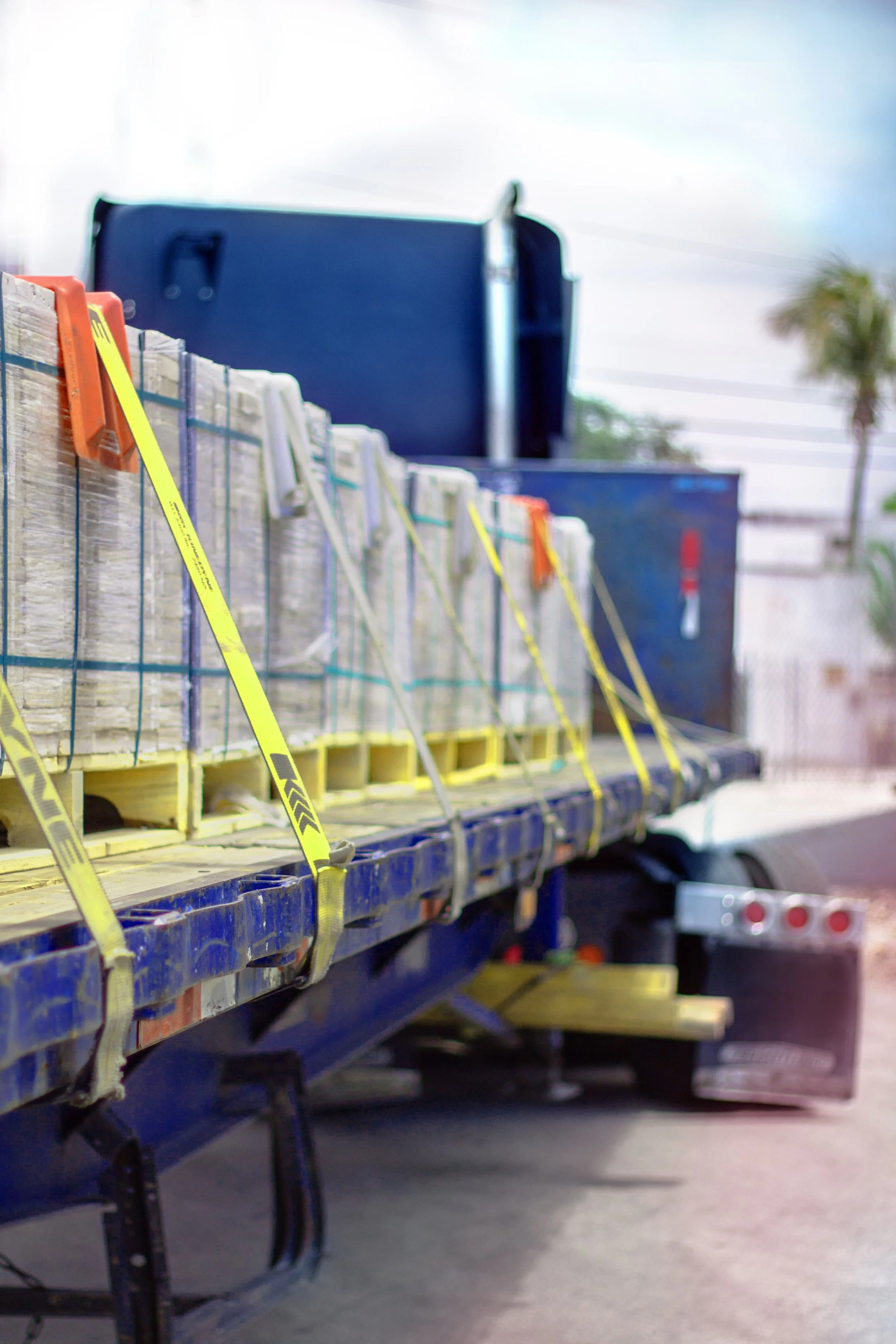 Flatbed leaving the Warehouse after being loaded