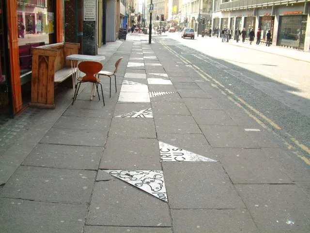 Moove over: The Inspirals’ cow grazing on the musical walk of fame on Manchester’s Oldham Street. 
