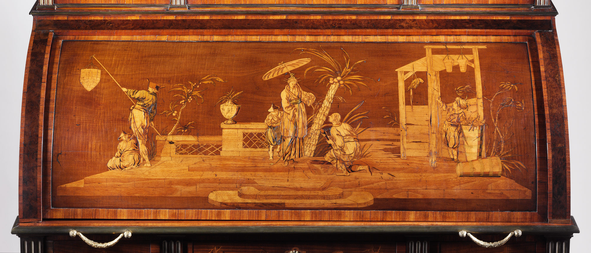 A detail of a marquetry panel on a Roentgen cylinder desk in the collection of the Metropolitan Museum of Art. Marquetry by Johann Michael Rummer.