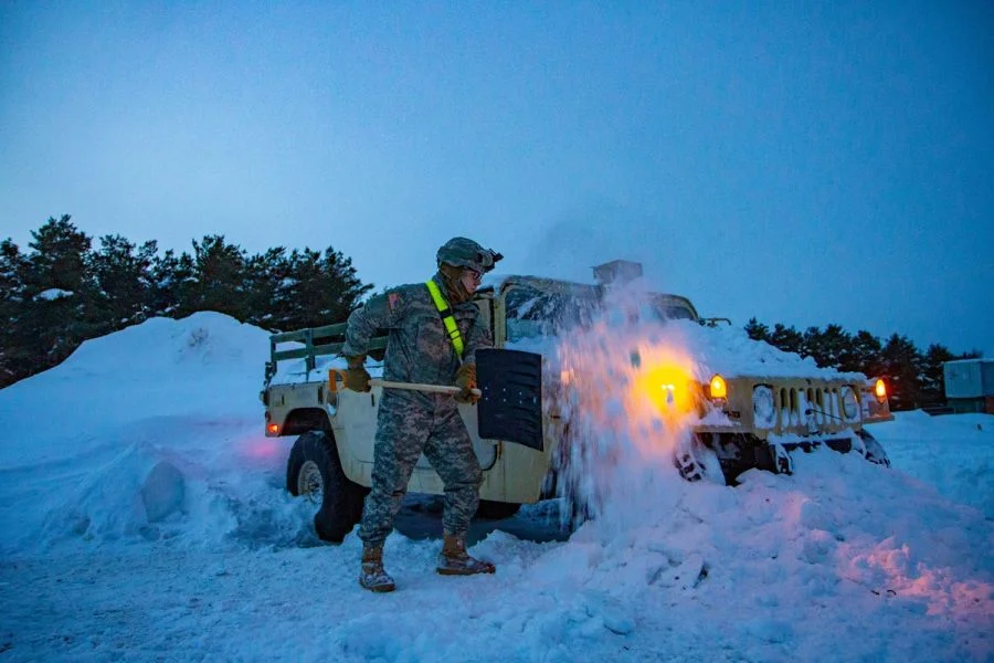 A Mountain Soldier digging his vehicle out of the snow amidst the 1st Polar Vortex of 2019. MICHAEL REINSCH/U.S. ARMY