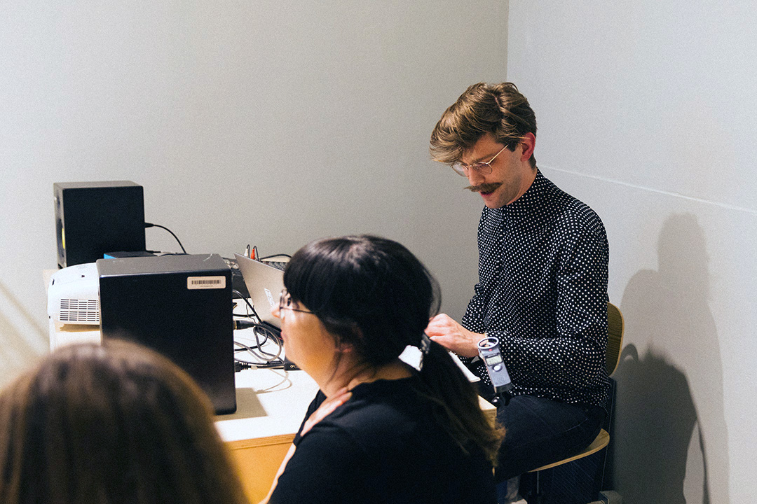 Tobias Ewé presenting a speculative talk, “The Heat Death of the Nonsense Verse.” June 4, 2019.