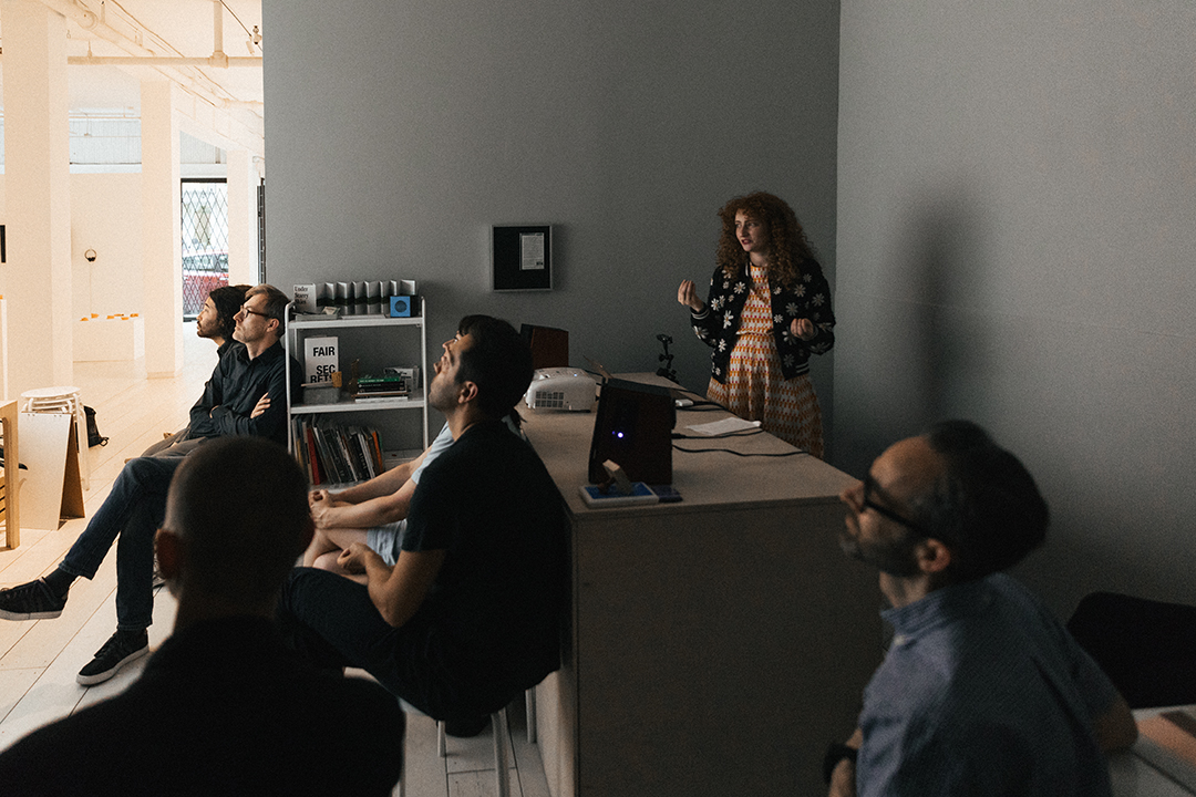 Artist Renée Reizman presenting a talk on pictorial postmarks, followed by a workshop, in the PLOT space. July 18, 2019.