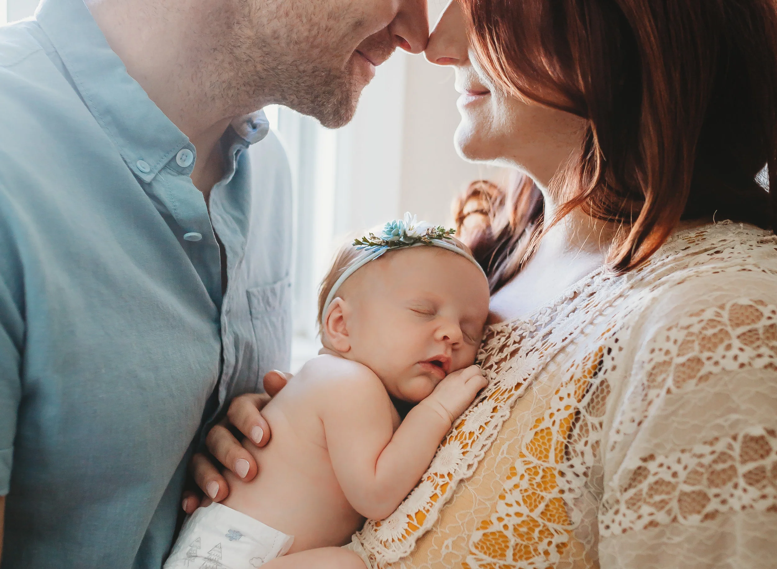 Newborn lifestyle sessions are all about capturing natural everyday moments with your newest bundle of joy. It's a good time to have fun, dance, relax, enjoy some coffee, and capture your authentic love as a growing family! With gentle posing, and minimal use of newborn props, you and your baby's personalities will be the focus.