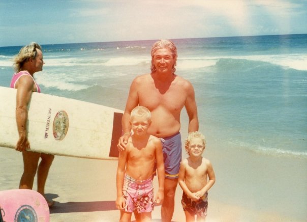 Brandon and Brent Russell with David Nuuhiwa and Corky Carroll in the background at the 1987 Hang Ten Contest at Sebastian inlet, FL. 
