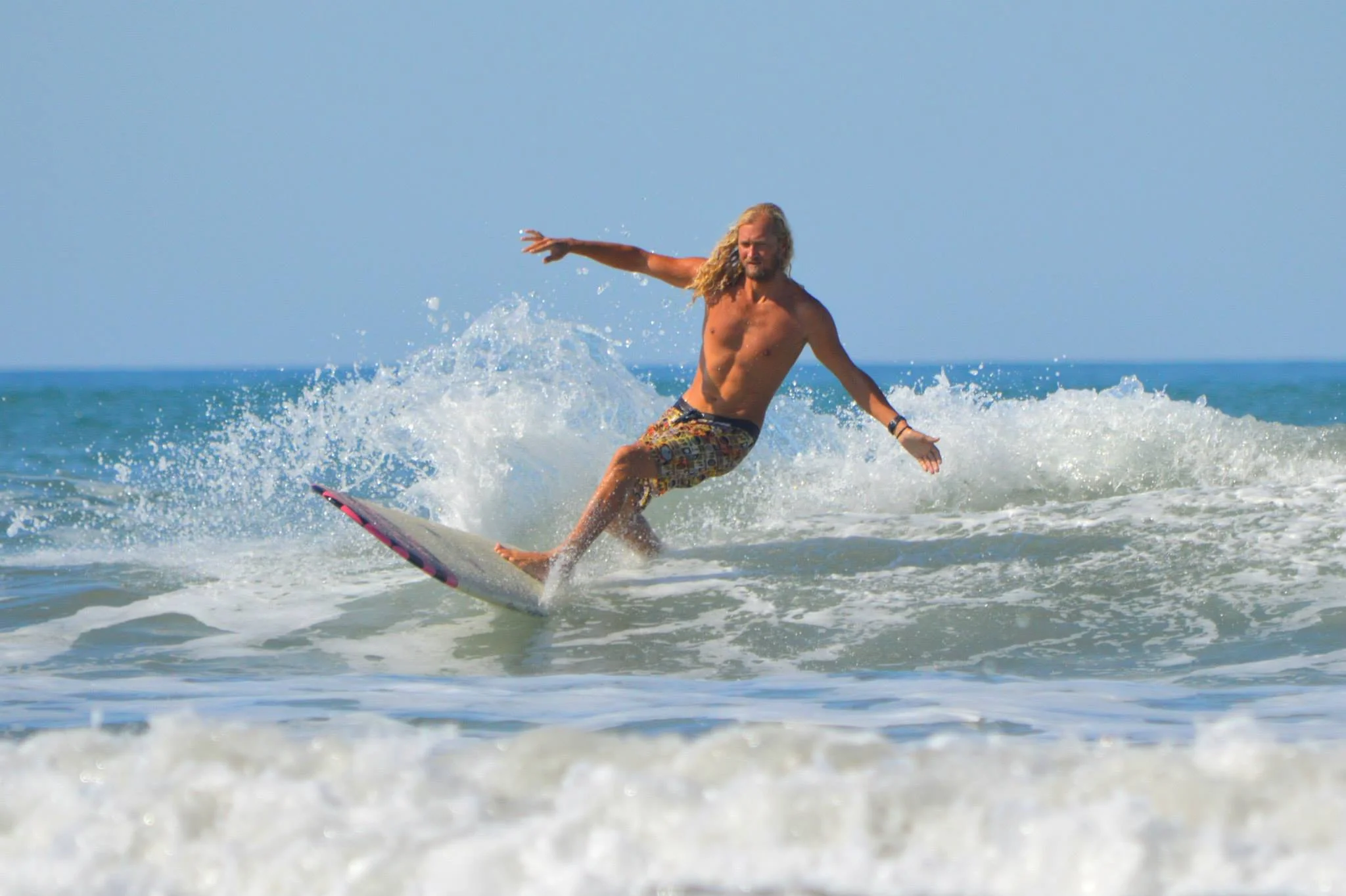 Brandon Russell on a borrowed "In The Pink" by Donald Takayama, Costa Rica 2014Photo: Siren Williams