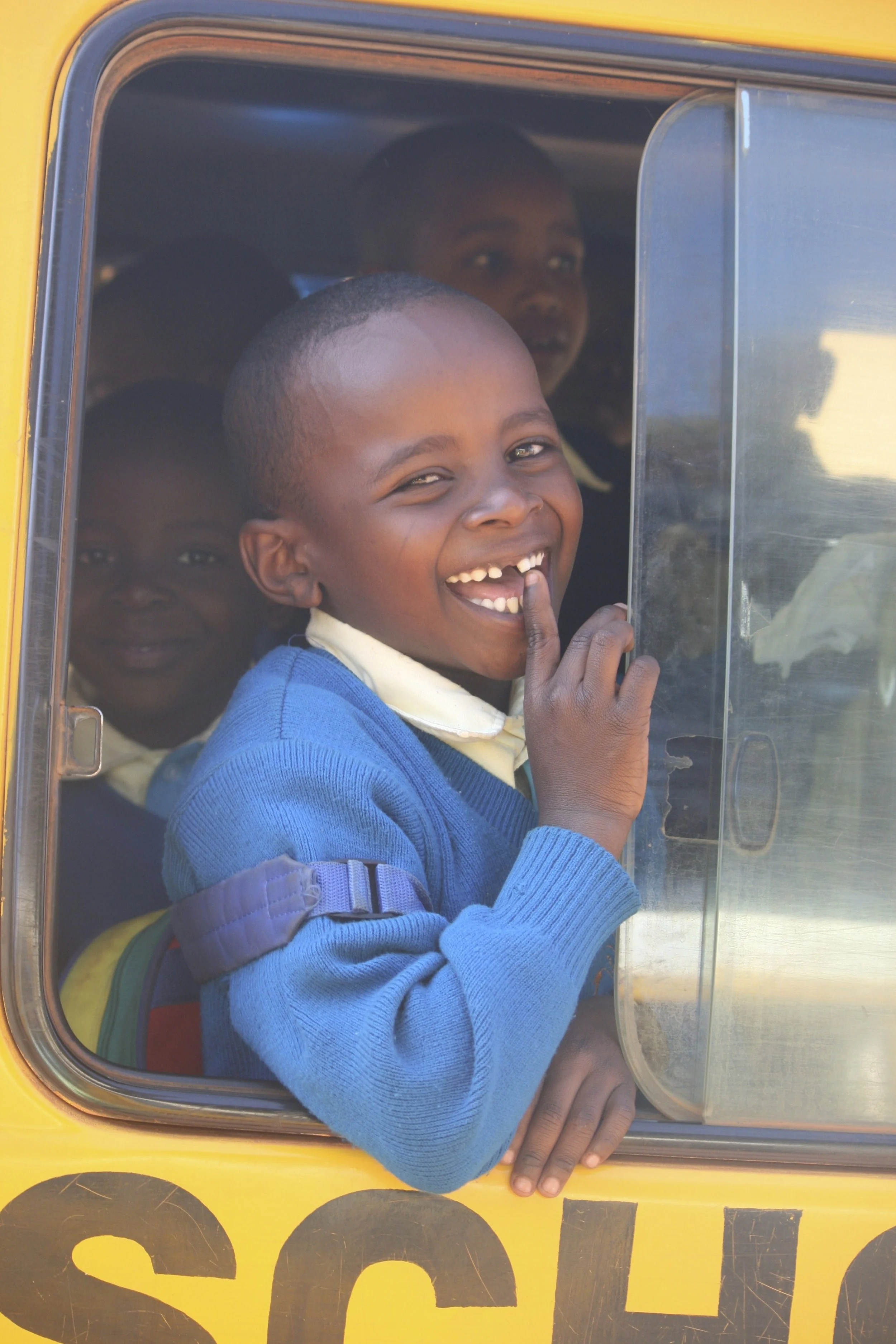 kid in school bus.jpg