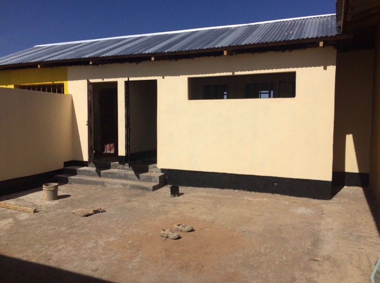 Above is the new toilet block for the boys' dorm (a mirror one is being built for the girls). Construction is almost complete, and we now need to raise funds to install water tanks and washing stations. 