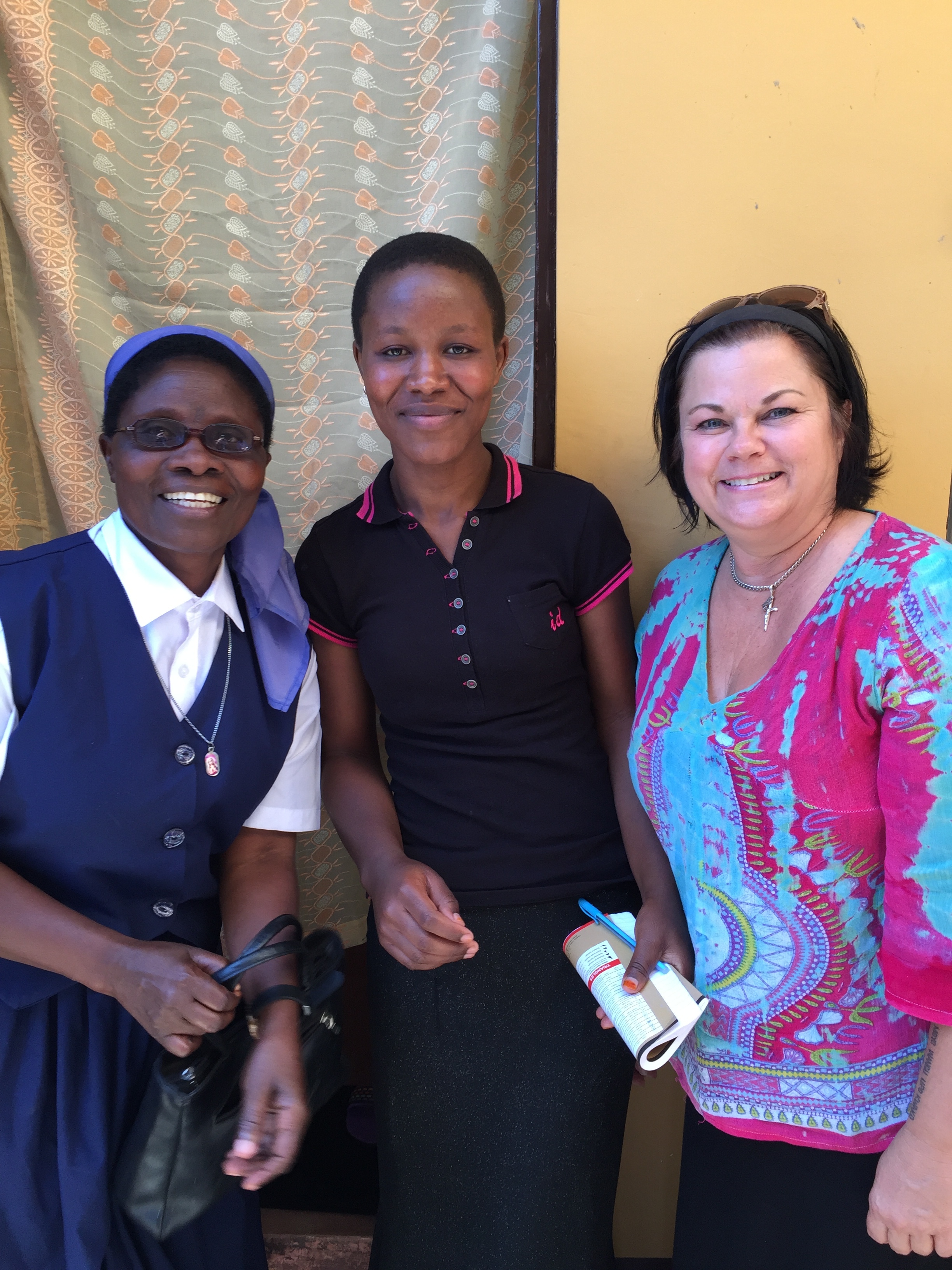 Thanks to a generous grant from The Greer Charities, Yukunda Florence (above center) and four other of the oldest St. Joseph's orphans are now attending university. Yukunda is studying at Mweka College of Africa Wildlife Management in Moshi and she is at the top of her class. 