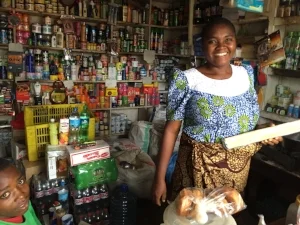 Alice in her small "duke" (general store) in Morogoro.