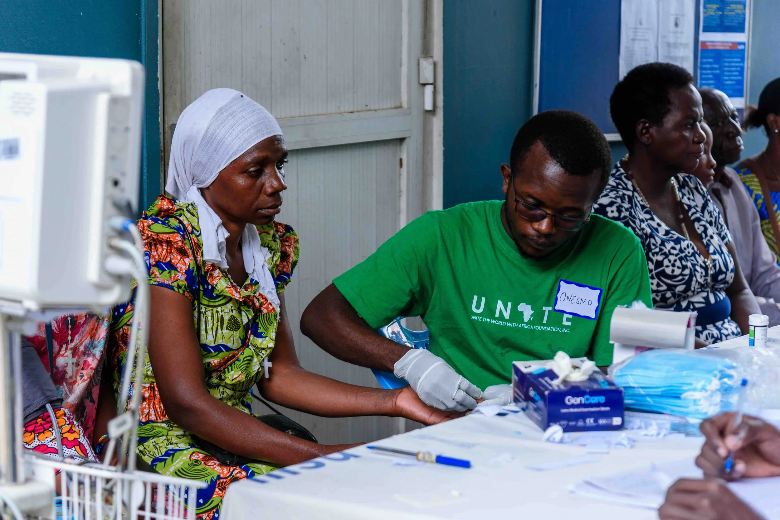 Photo 13-07-2025- Onesmo serving the patient during cardinal Rugambwa day.jpeg