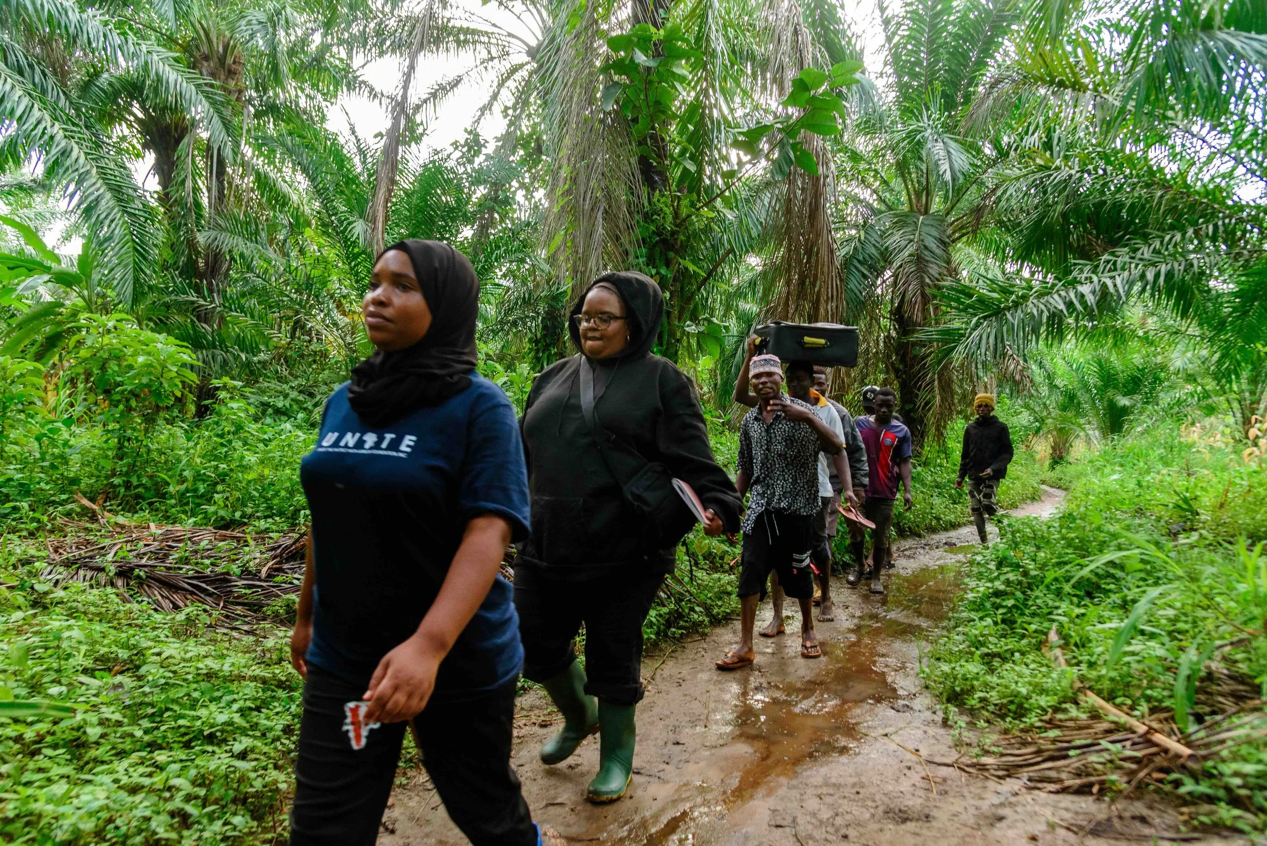 2026.03.01_Ashura Kayya with Joan walking to meet Scholar Elias.jpeg
