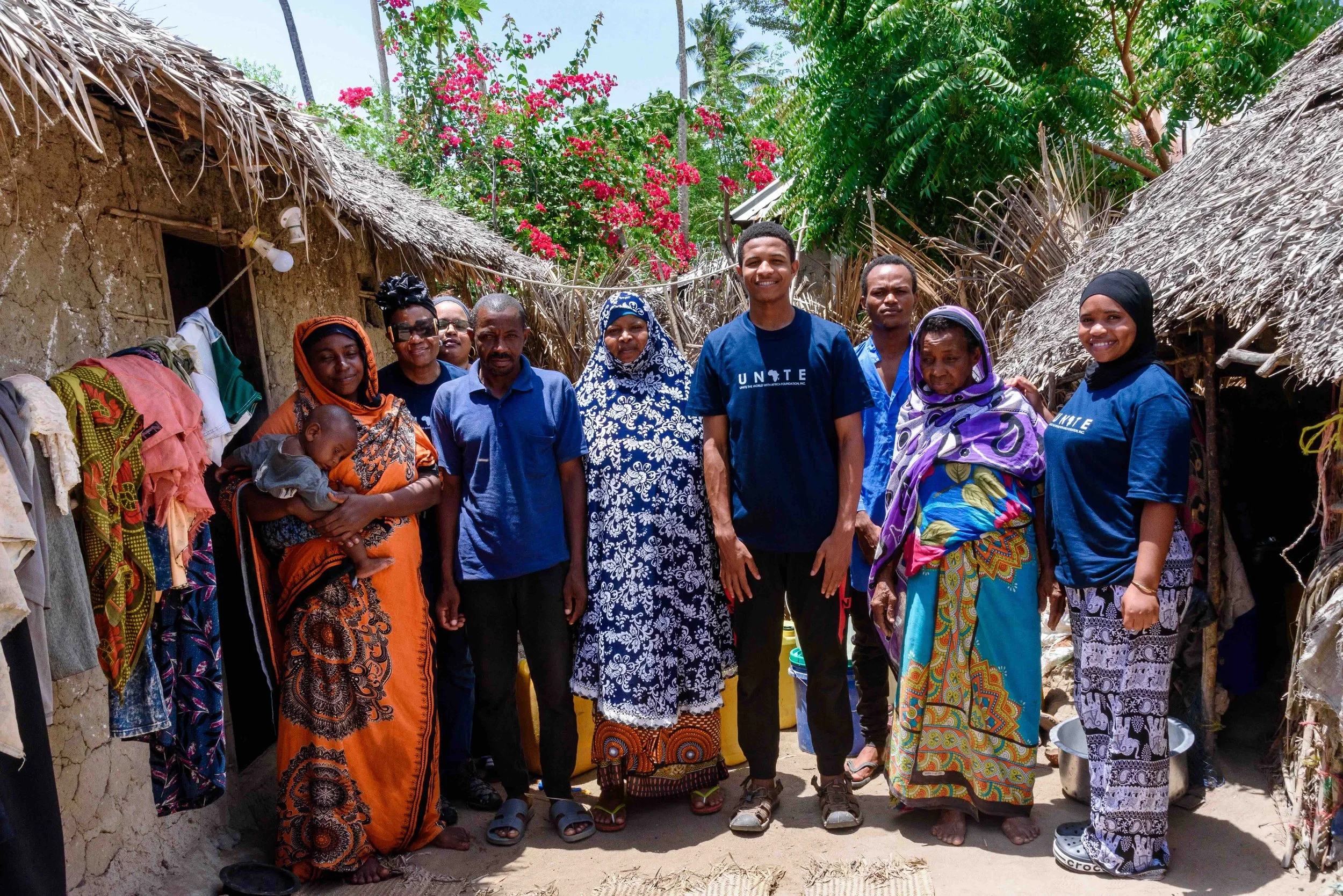 2026.02.20_Unite team and Rashid's family group photo.jpeg