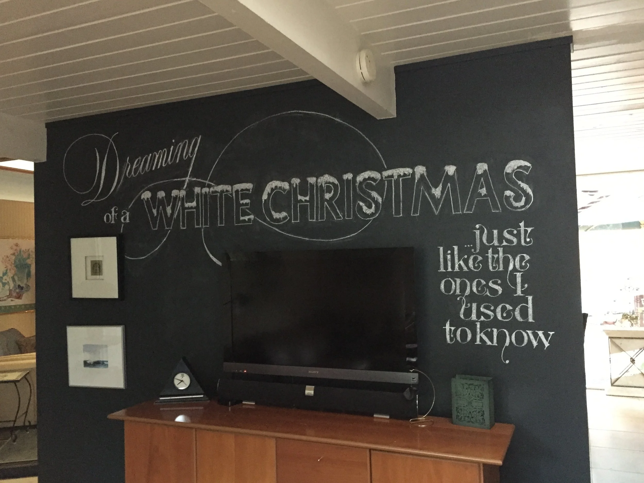 Christmas chalk wall installation, private home