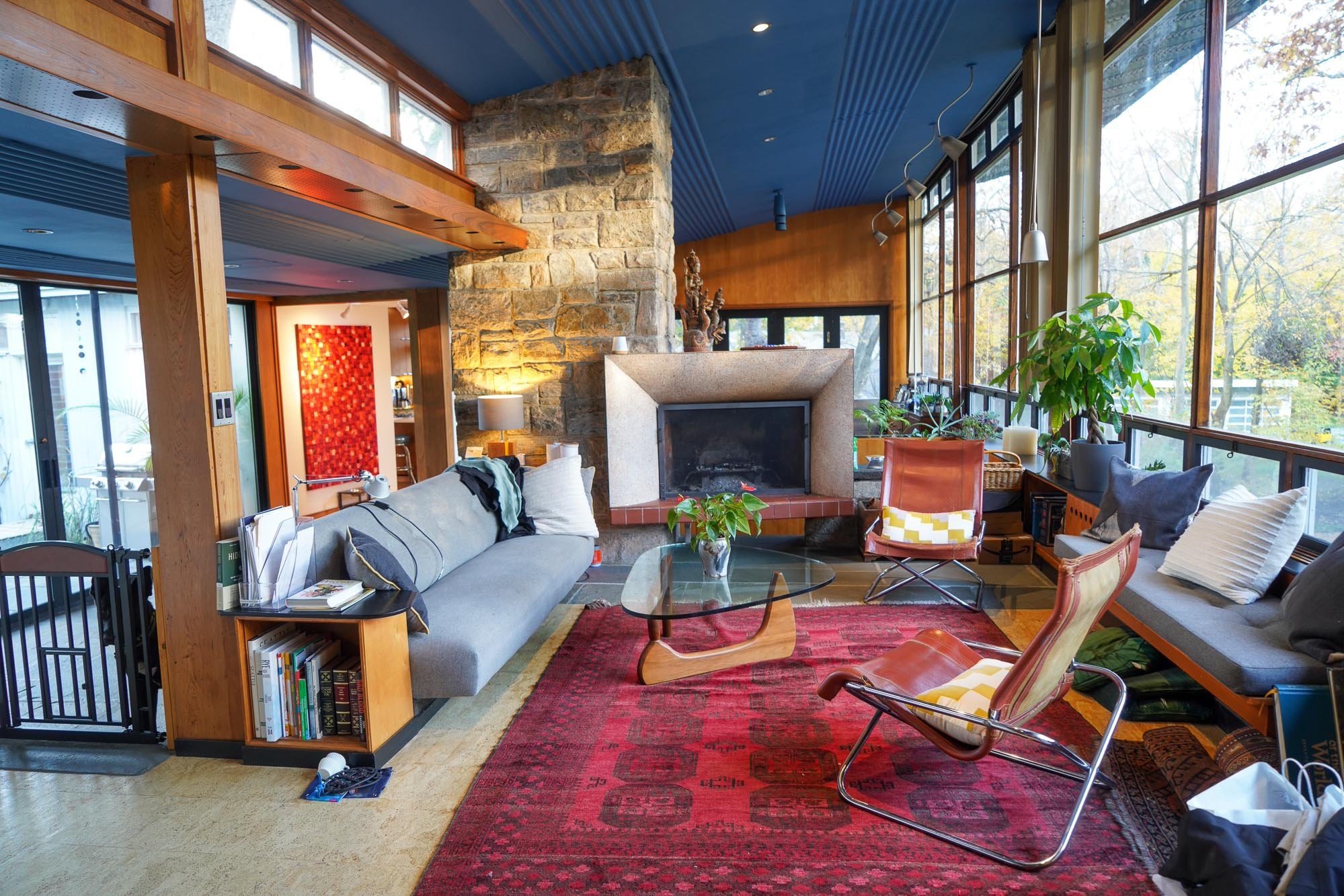  One of the earliest passive energy homes in the US built in 1949, it features an unusually large western exposed side of floor to ceiling windows. 