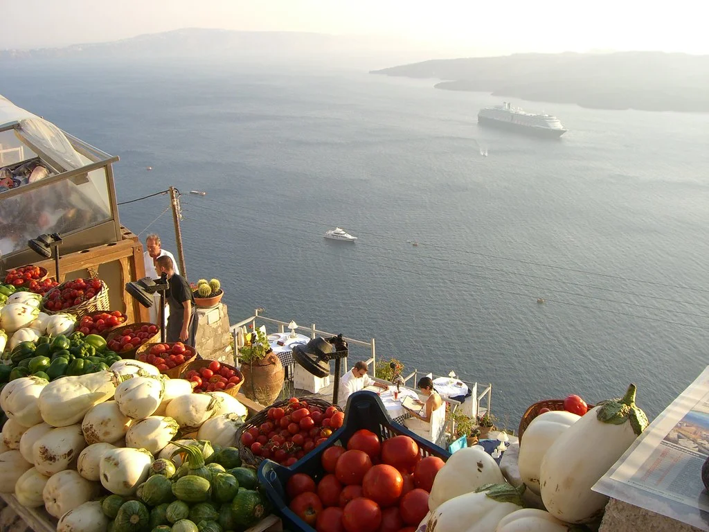 Santorini Cook, Wine and Dine • Visit 2 renowned and awarded wineries and taste the major types of terroir-driven wines of Santorini paired with cheese and local delicacies • Walk in an old, phylloxera-free vineyard and learn about the ancient vine training method and the Santorini's distinctive terroir • Visit the Santorini Donkey Brewery and taste fresh, unfiltered and unpasteurized beers • Experience the authentic taste of the gastronomy of Santorini and learn about the culinary traditions by participating in a cooking class with a professional chef • Enjoy a meal with all the recipes you prepared, paired with local wine • Pick up & drop off Tour Time: Approximately 6 hours Group Size: Available as a private tour or small group of up to 6 people