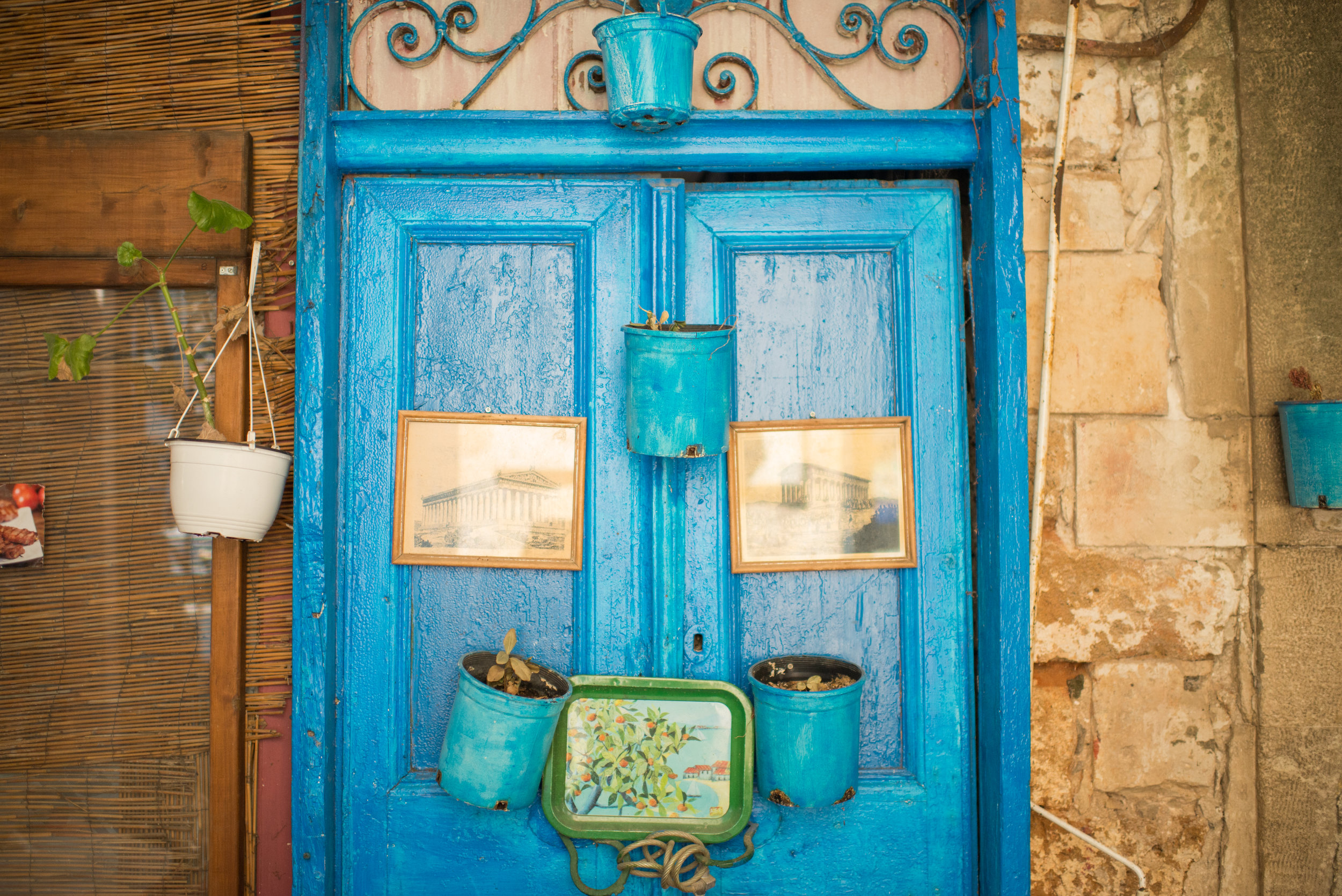 Places, People & Flavors of Crete • Visit is to the monastery of Agia Triada Tzagarolon. Built in the 17th century, with a majestic cruciform church, it is set on a wonderfully overgrown landscape of olive groves, vineyards and cypress trees. We will visit the premises and learn about their production of organic olive oil and wine. • the verdant province of Apokoronas, we will stop by the Fortress of Koules, set on an impressive position with views over Souda Gulf. • a stop is at the tiny Maheri, one of the most authentic and unspoilt Cretan villages for a stroll around its alleys and refreshments at a typical ‘kafenion’. • a visit to the studio of a known local ceramicist. The house, featured many times in Greek and international press, is an excellent example of traditional architecture, renovated in perfect harmony with the surrounding countryside. • a delicious rustic meal at a family-run tavern, located on a privileged vista point overlooking the valley and the sea. Tour Time: Approximately 6 1/2 hours Group Size: Available as a private tour or small group up to of 10 people